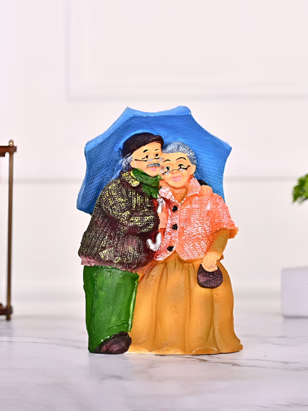 

DecorTwist Green & Blue Dada Dadi Decorative Couple Showpiece