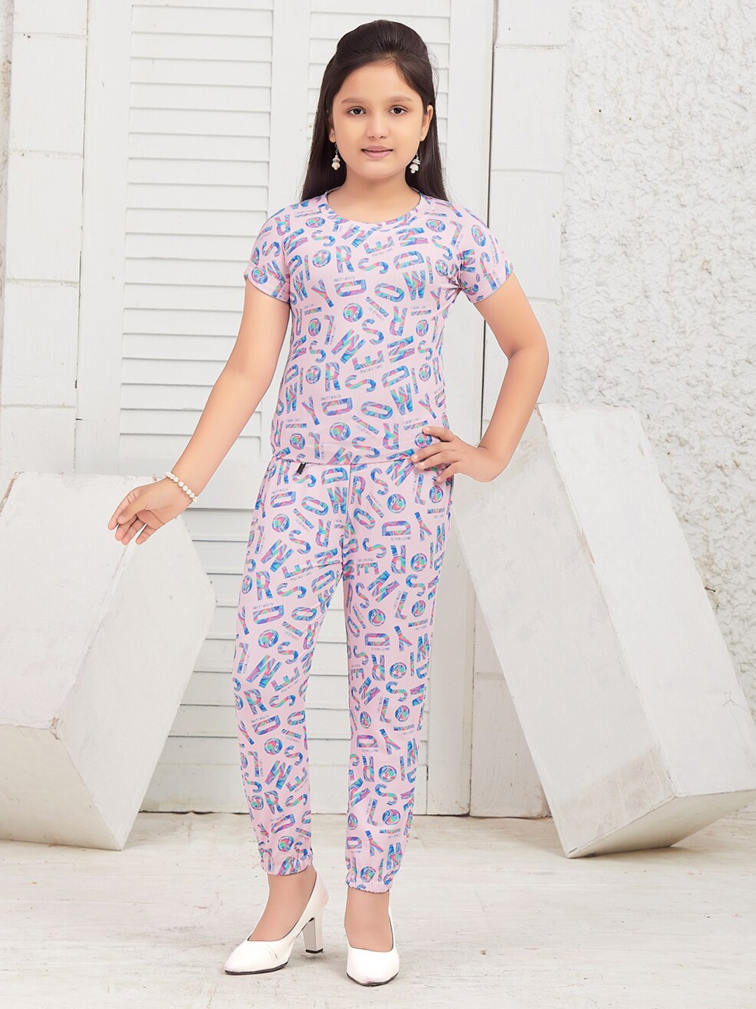 

Aarika Girls Printed Round Neck T-shirt with Trousers, Pink