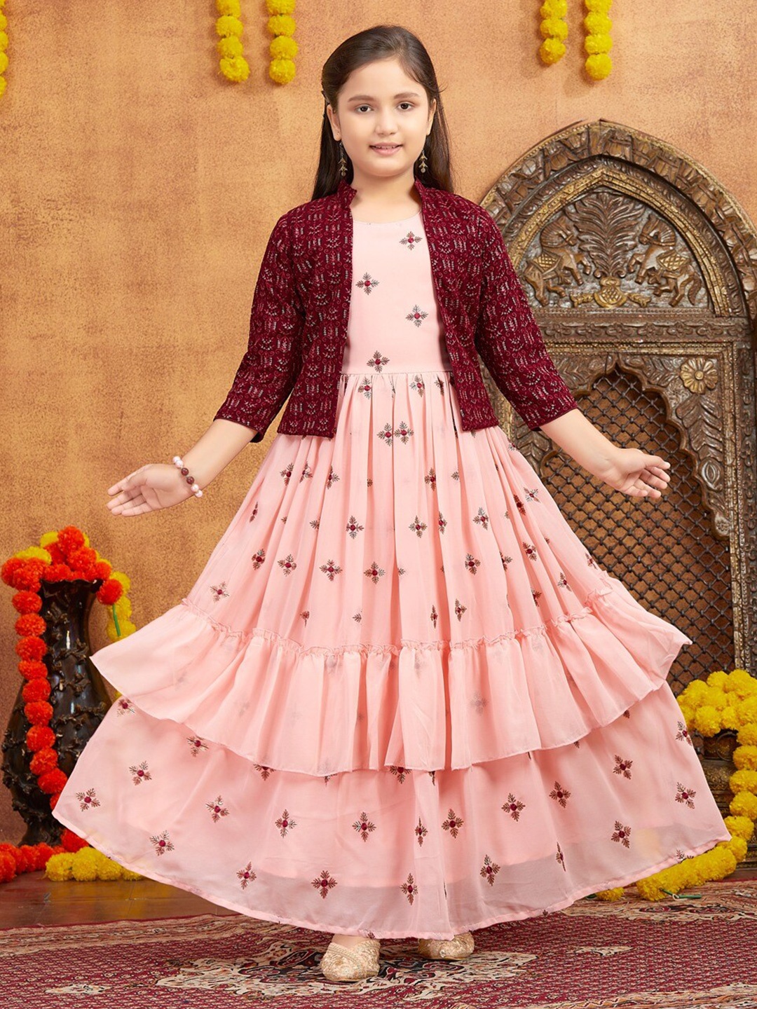 

Aarika Girls Embroidery Round Neck Maxi Dress With Shrug And Bracelet, Peach