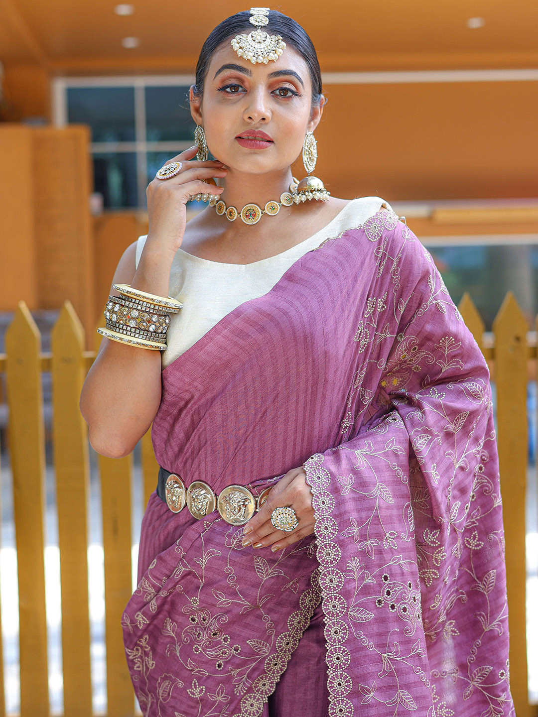

Munir Purple Embellished Embroidered Silk Saree