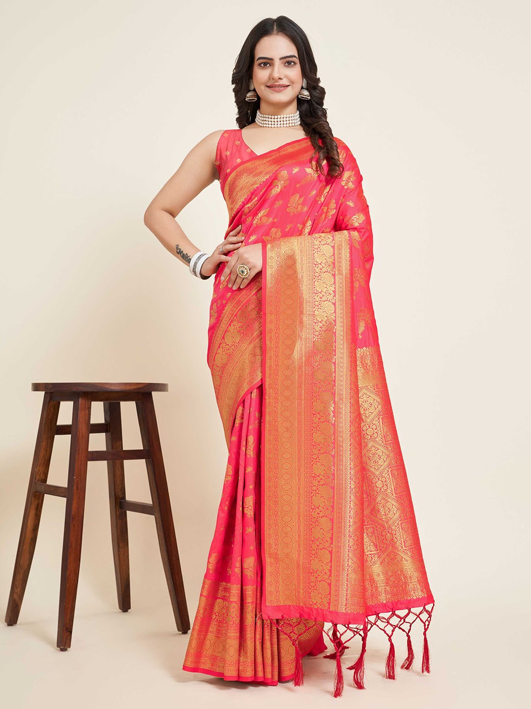 

Mitera Peach Coloured & GoldToned Ethnic Woven Design Zari Silk Banarasi Saree