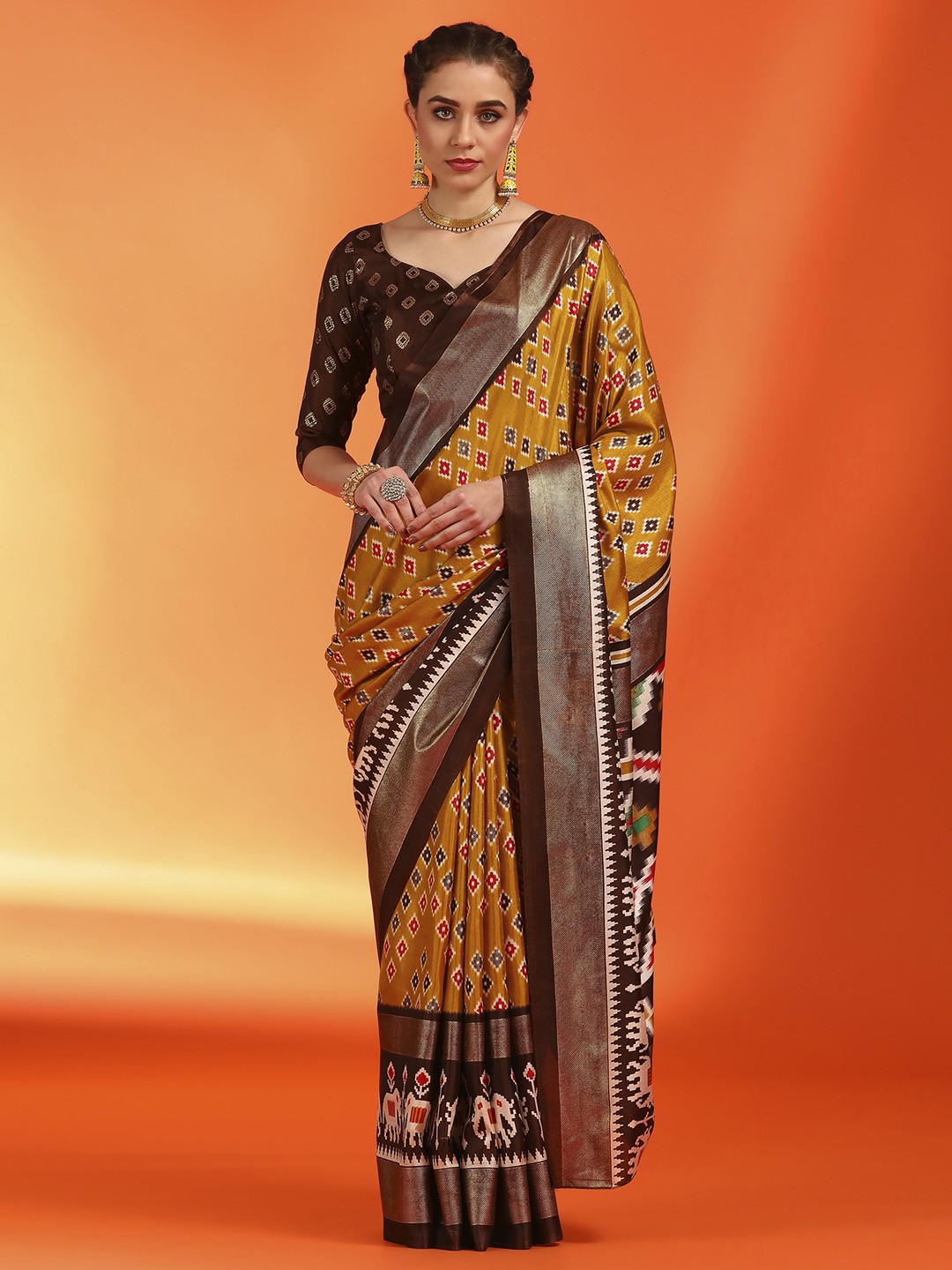 

Saree mall Mustard & Brown Ethnic Motifs Printed Zari Sarees