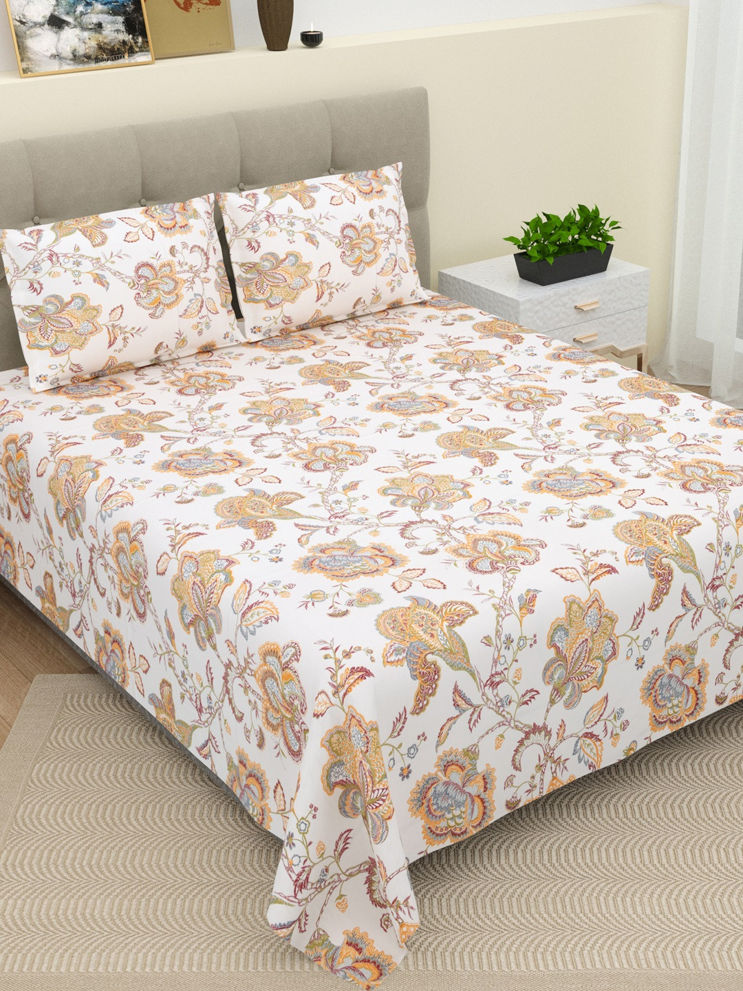 

DREAM WEAVERZ Orange & White Floral Cotton 220 TC King Bedsheet With 2 Pillow Covers