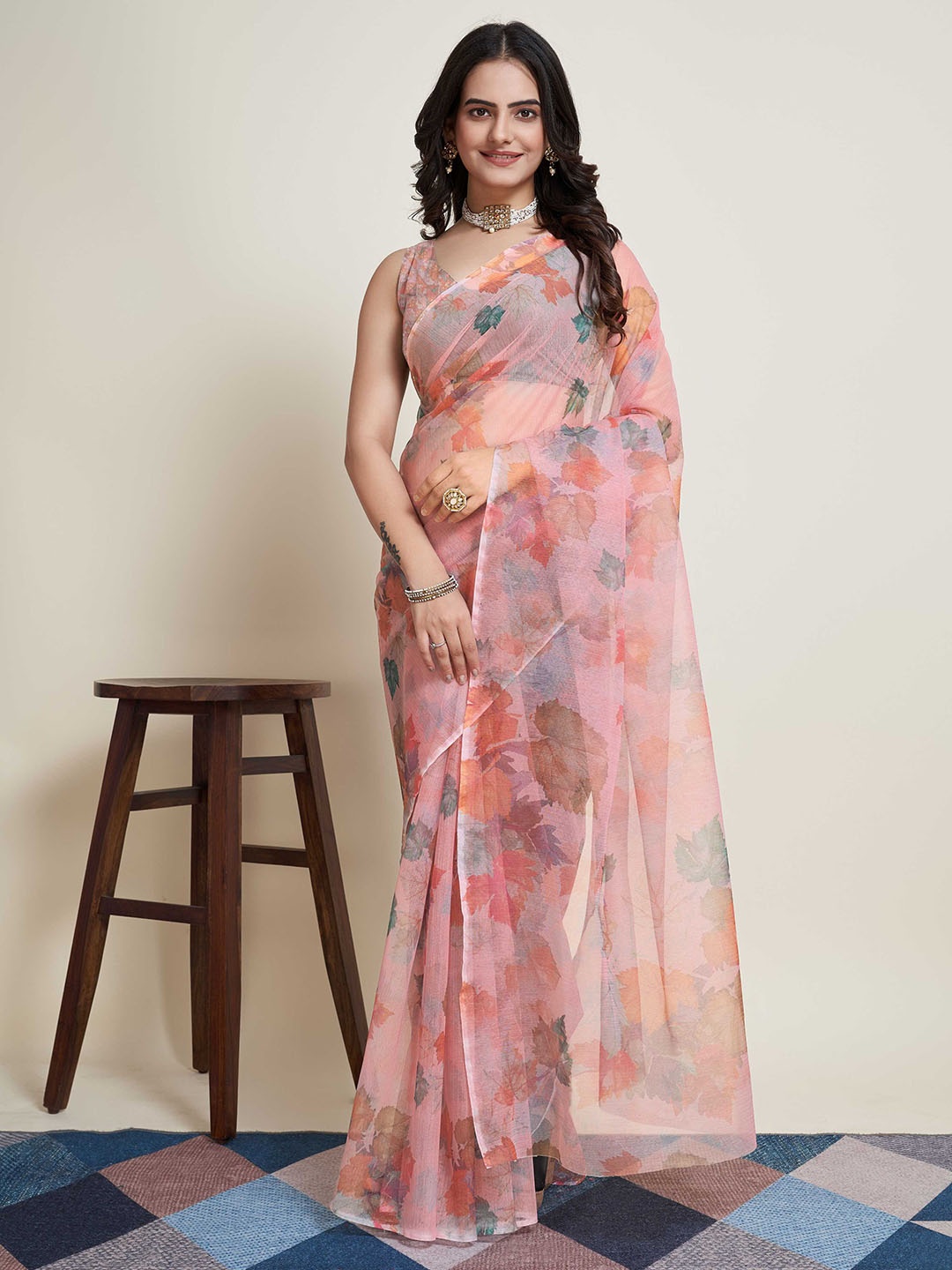 

Mitera Pink & Blue Floral Supernet Saree