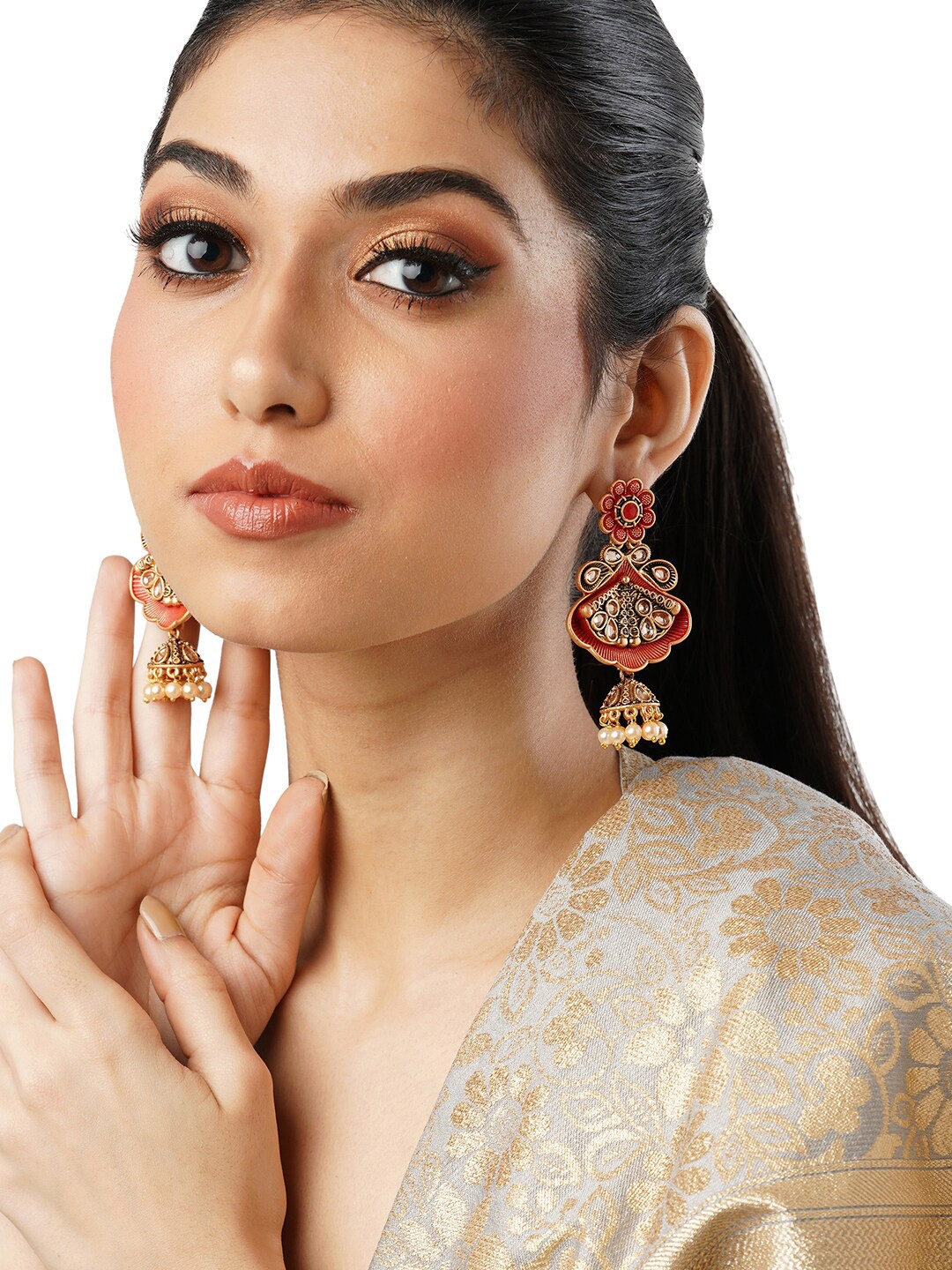 

Anouk Gold-Toned Brass-Plated Dome Shaped Jhumkas