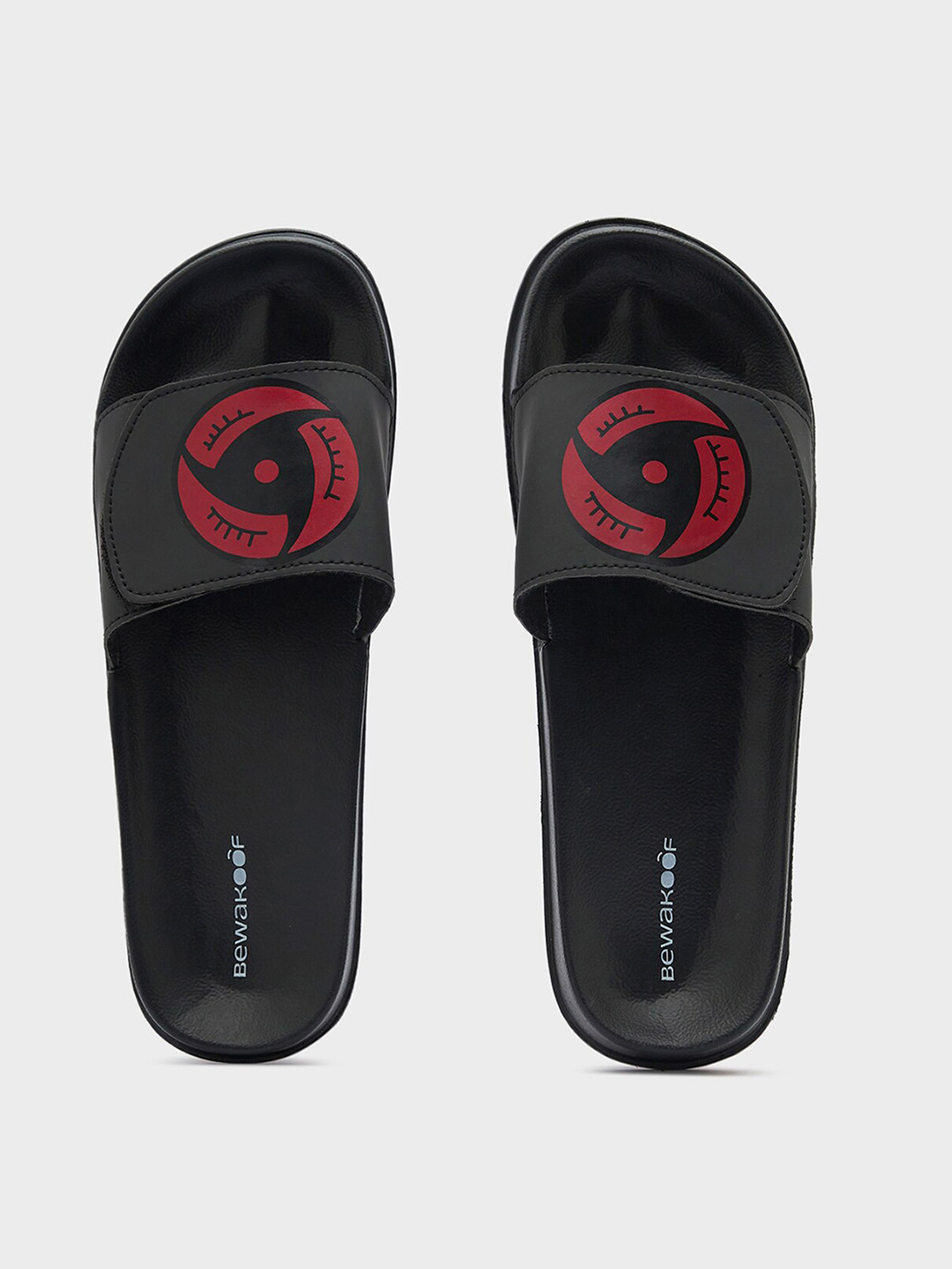 

Bewakoof Men Itachi Sharingan Printed Rubber Sliders, Black