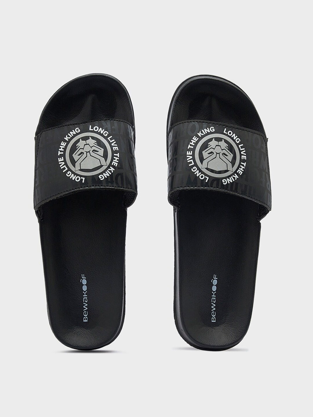 

Bewakoof Men Black Panther Printed Rubber Sliders