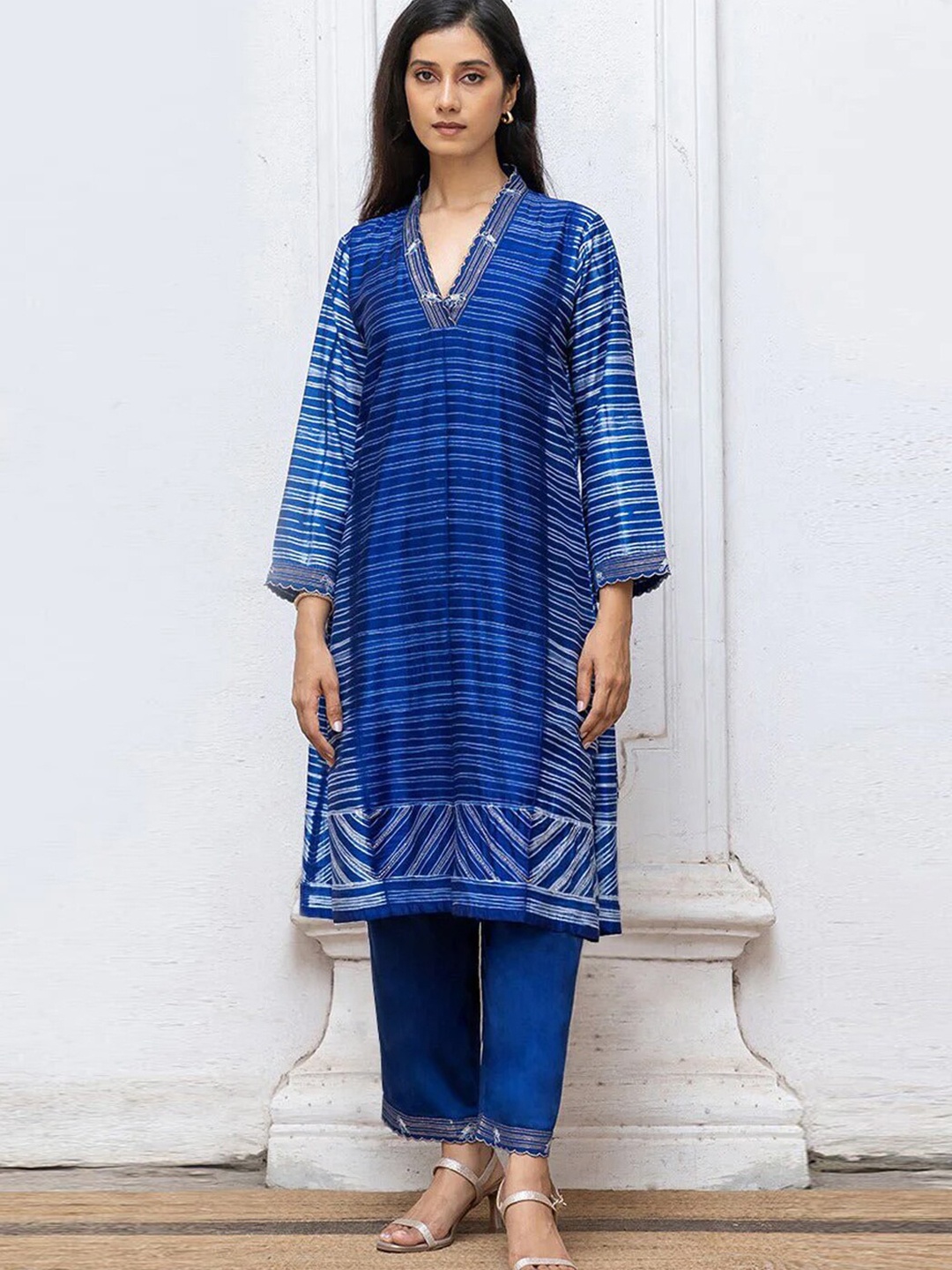 

Ganga Striped V Neck Long Sleeves Thread Work Kurta with Trousers, Blue