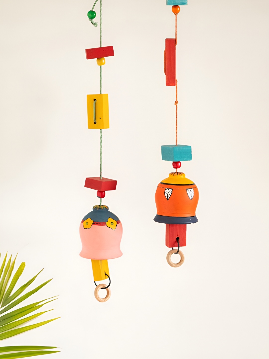

ExclusiveLane Pink & Orange Coloured 2 Pcs Tuned Melody Wall Hangings