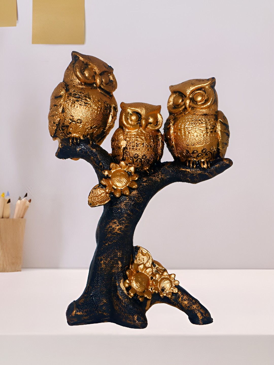 

HOME AUZAR Gold Toned Three Owls Perched on a Branch Curio Showpiece