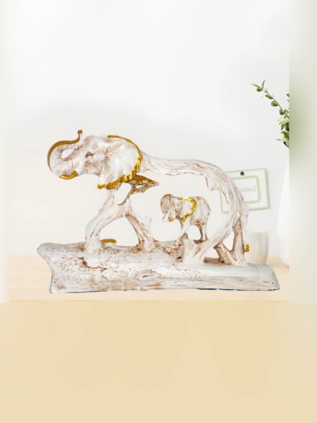 

HOME AUZAR Beige & Gold Animals Curio Showpiece