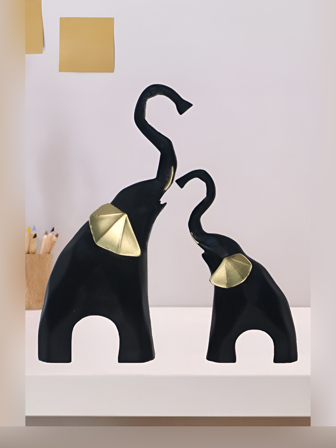 

HOME AUZAR Black and GoldToned 2 Pieces Geometric Elephant Sculpture Display Showpiece