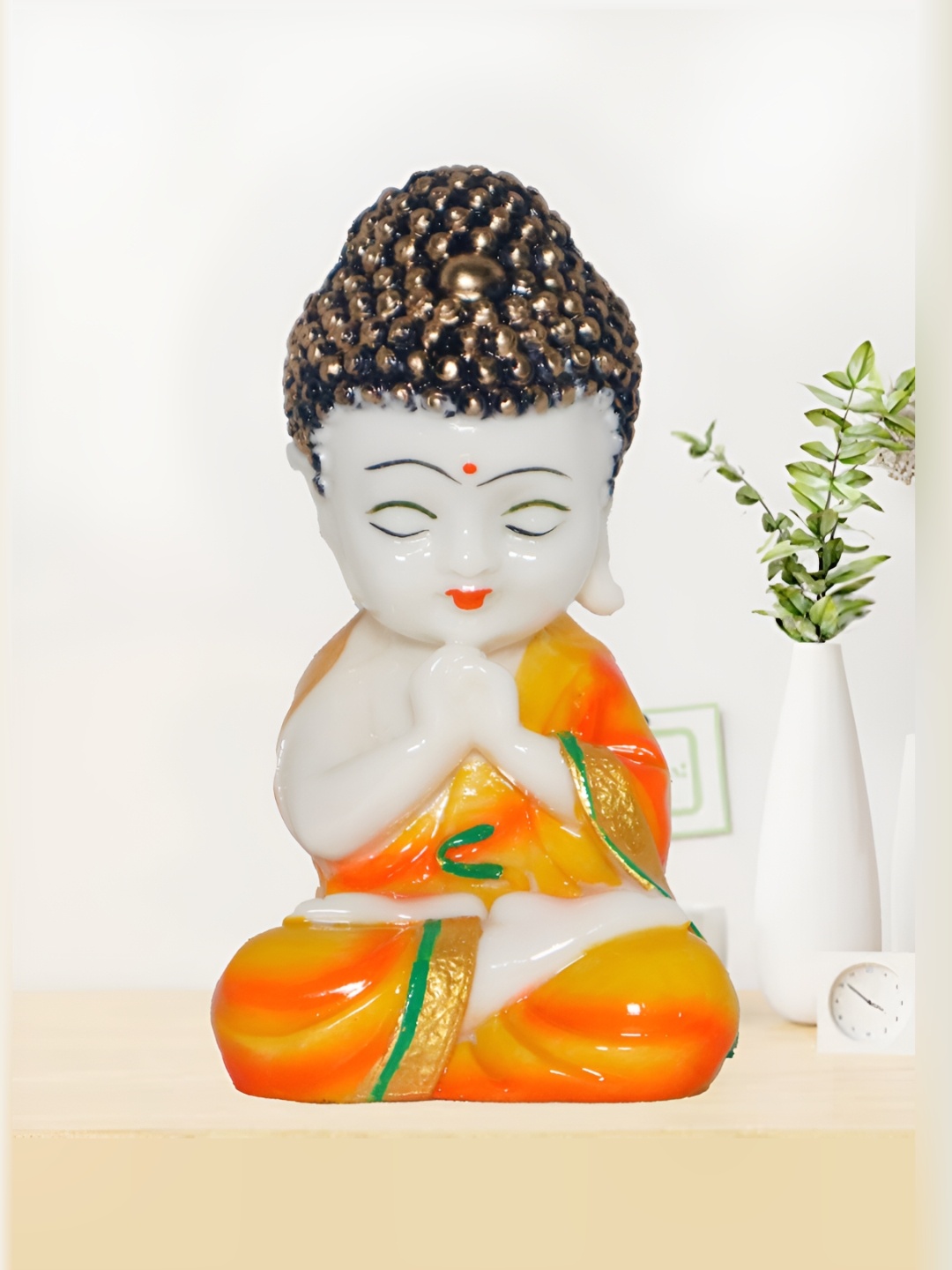 

HOME AUZAR Yellow and Orange Buddha Idol Showpiece