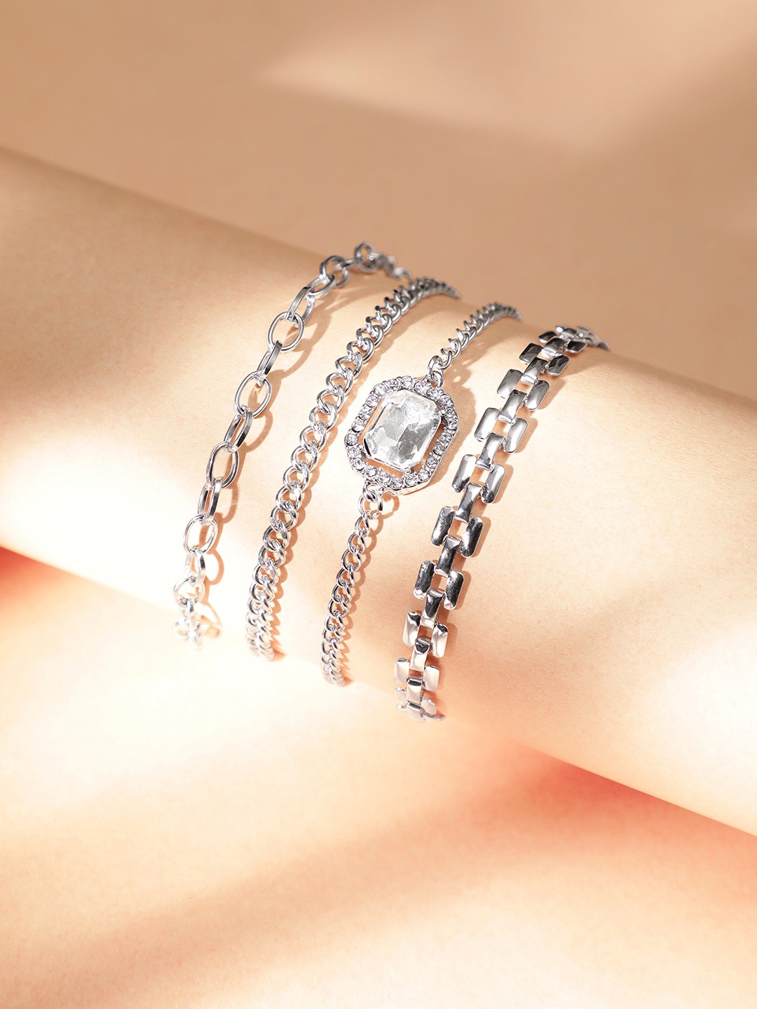

Rubans Voguish Set Of 4 Silver-Plated Crystals Studded Link Bracelet