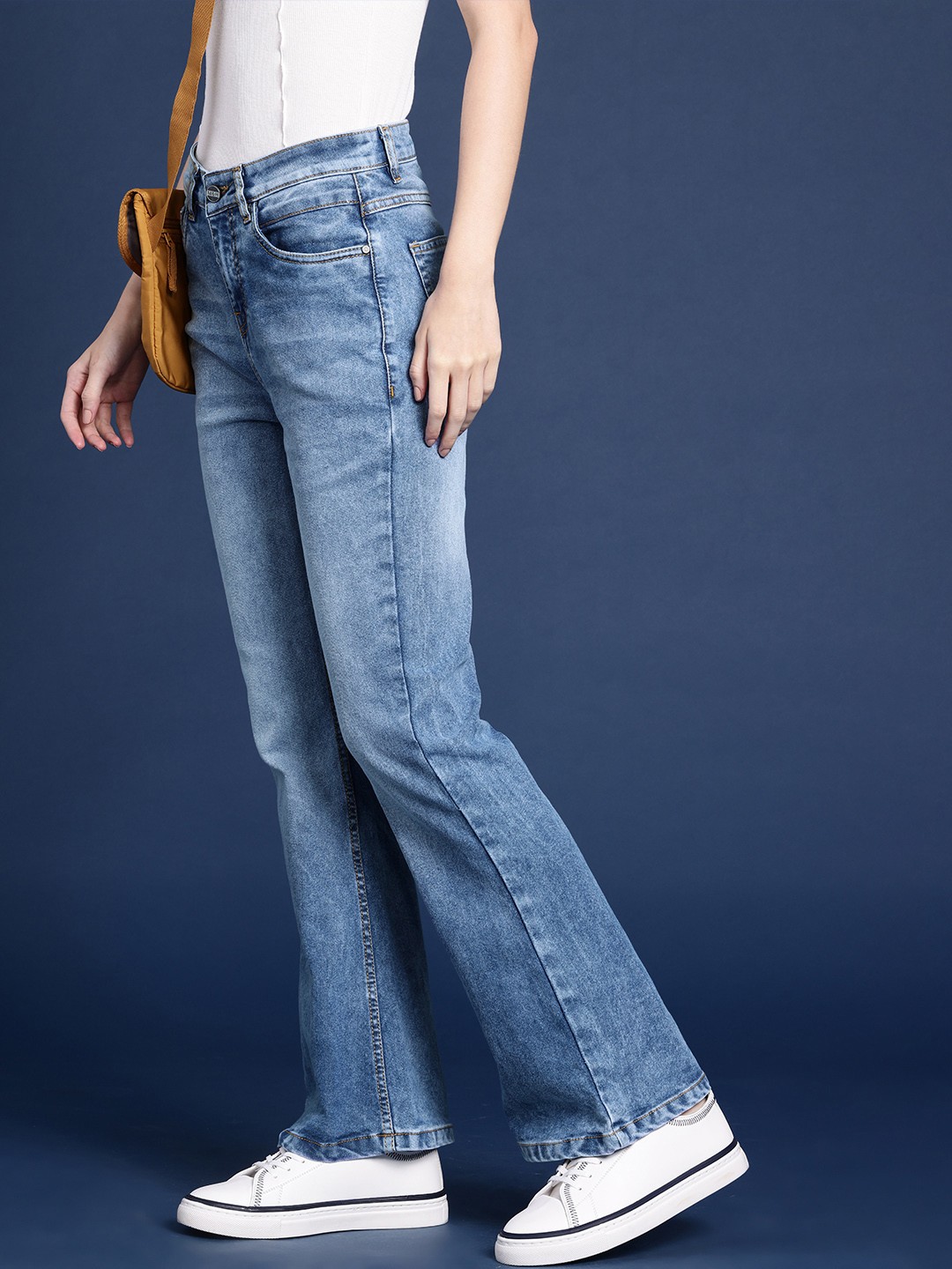 

Mast & Harbour Women Flared Heavy Fade Stretchable Mid-Rise Jeans, Blue