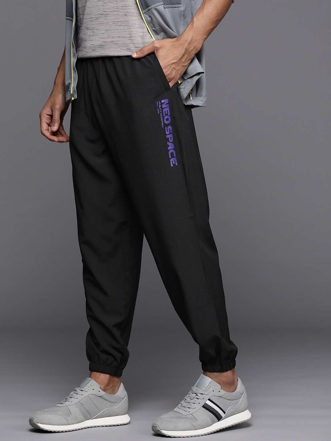 

HRX by Hrithik Roshan Men Solid Relaxed Fit Joggers, Black