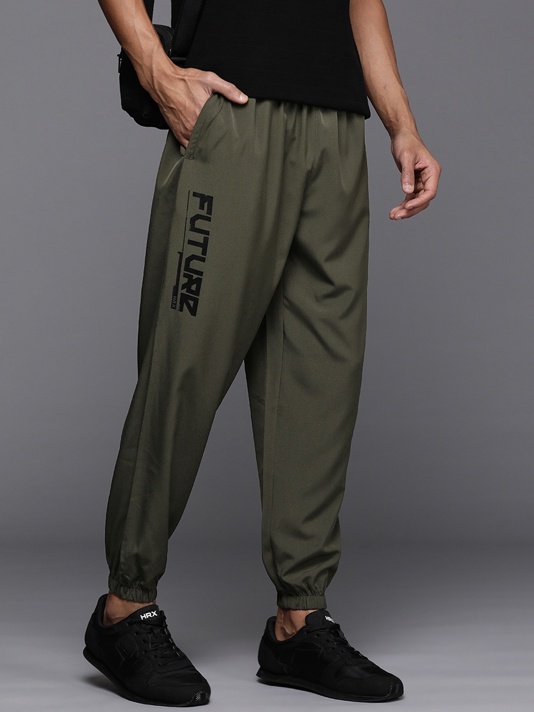 

HRX by Hrithik Roshan Men Solid Relaxed Fit Joggers, Olive