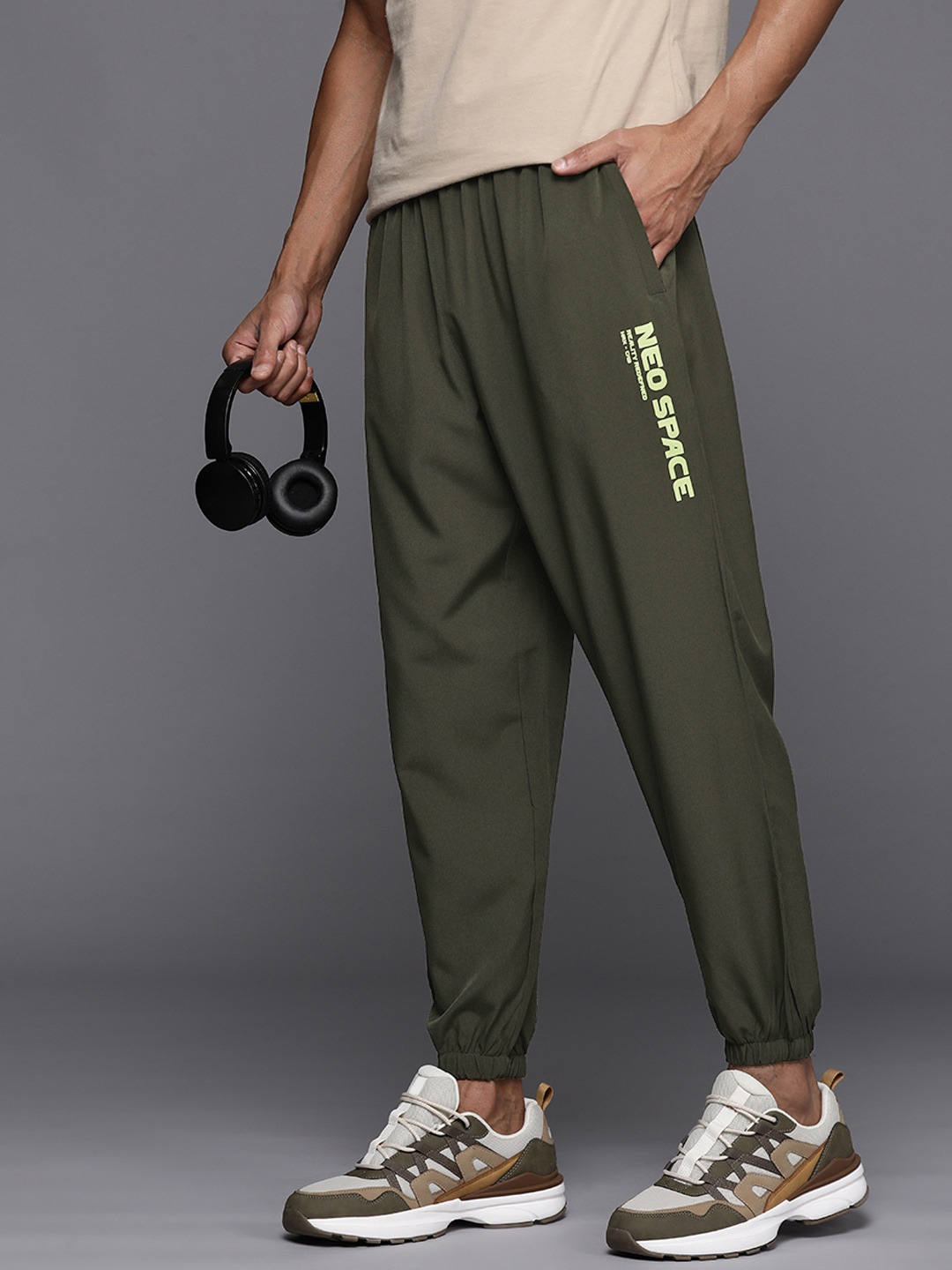 

HRX by Hrithik Roshan Men Solid Relaxed Fit Joggers, Olive