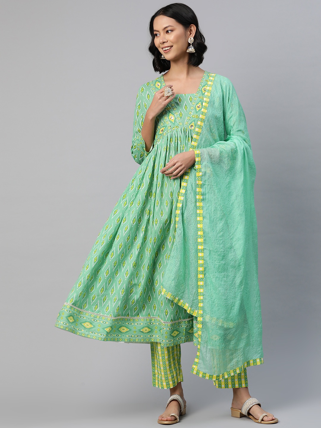 

Readiprint Fashions Women Ethnic Motifs Printed Empire Sequinned Pure Cotton Kurta Set, Green