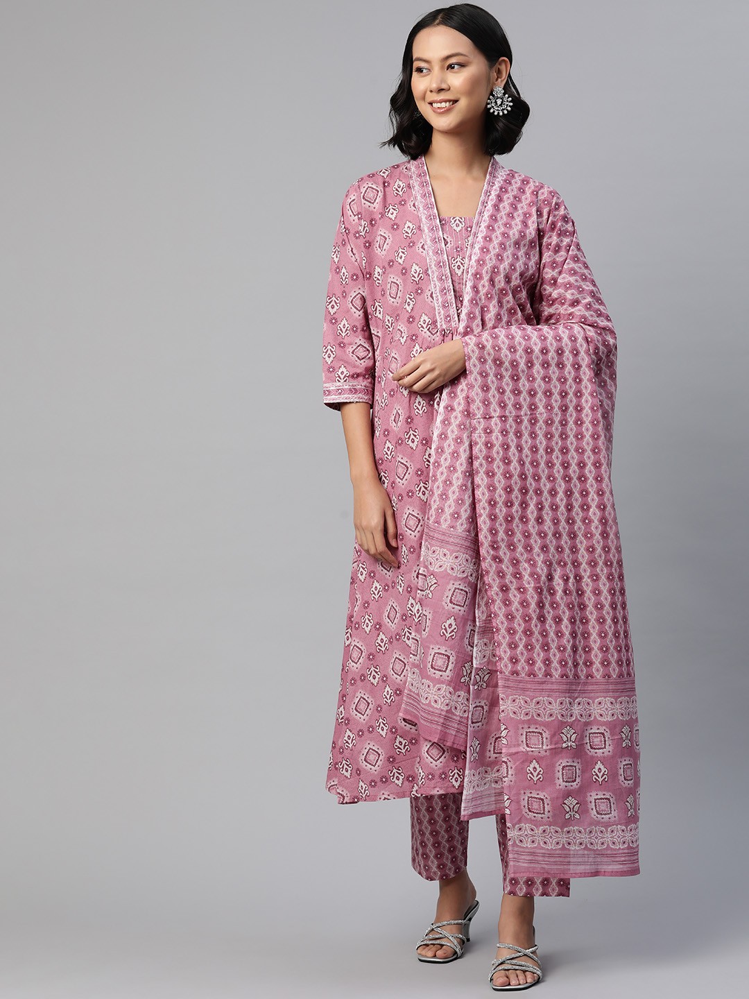 

Readiprint Women Floral Printed Regular Thread Work Pure Cotton Kurta Set, Mauve