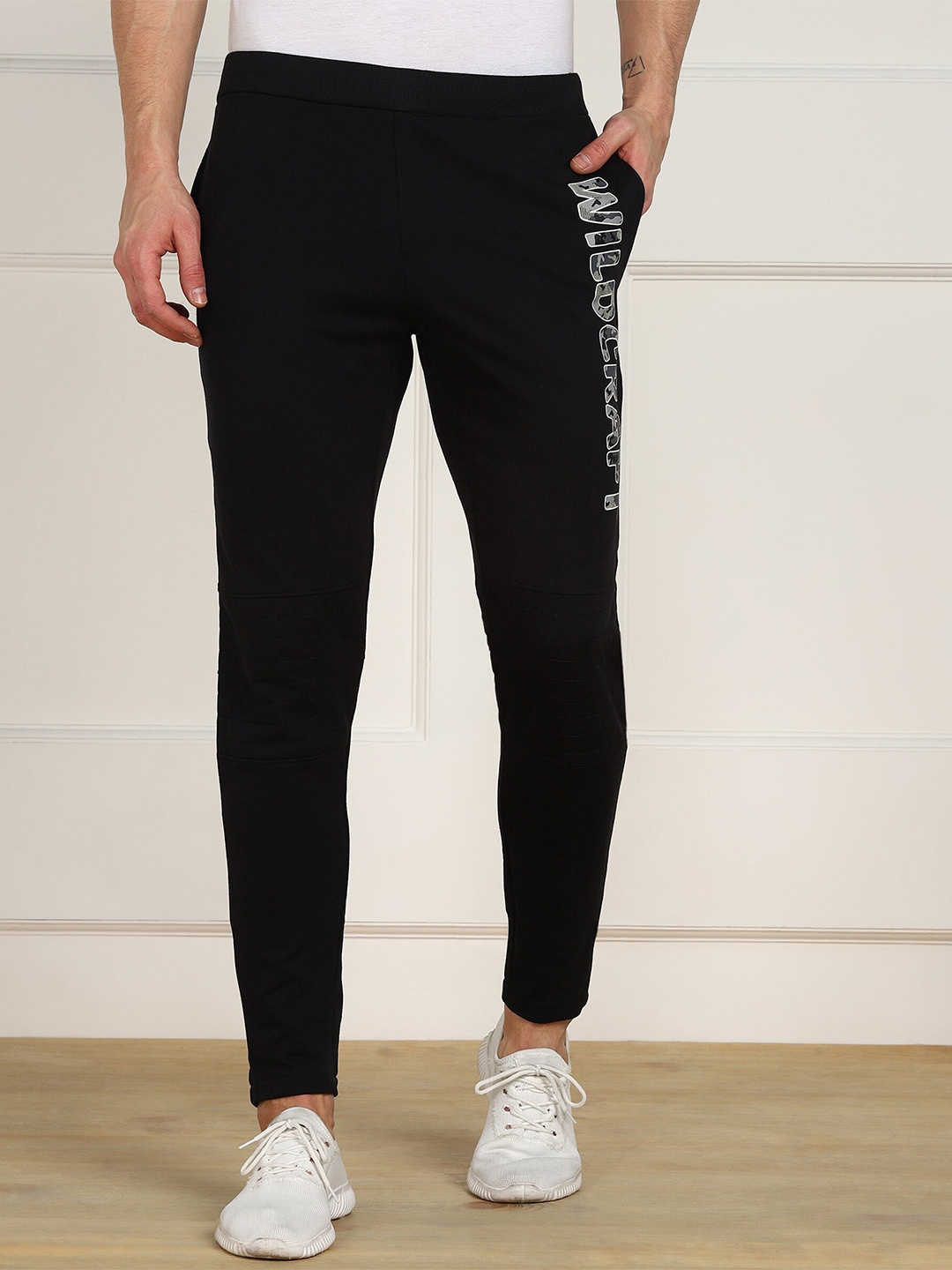 

Wildcraft Men Typography Printed Cotton Track Pants, Black