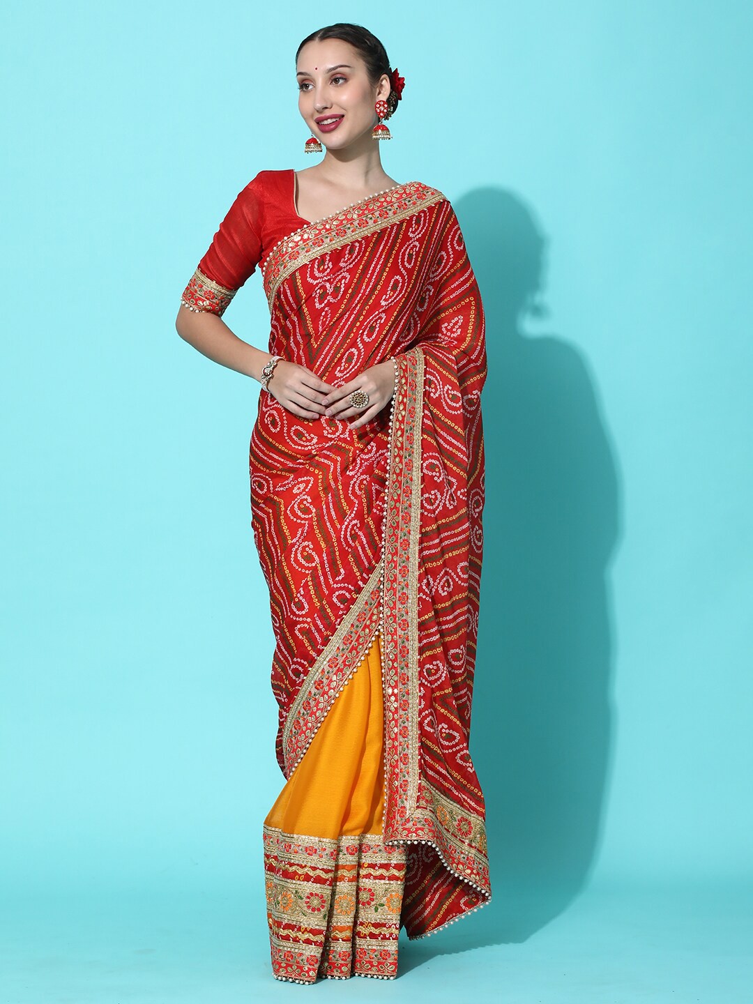 

Mitera Yellow & Red Bandhani Embroidered Pure Chiffon Half & Half Bandhani Saree