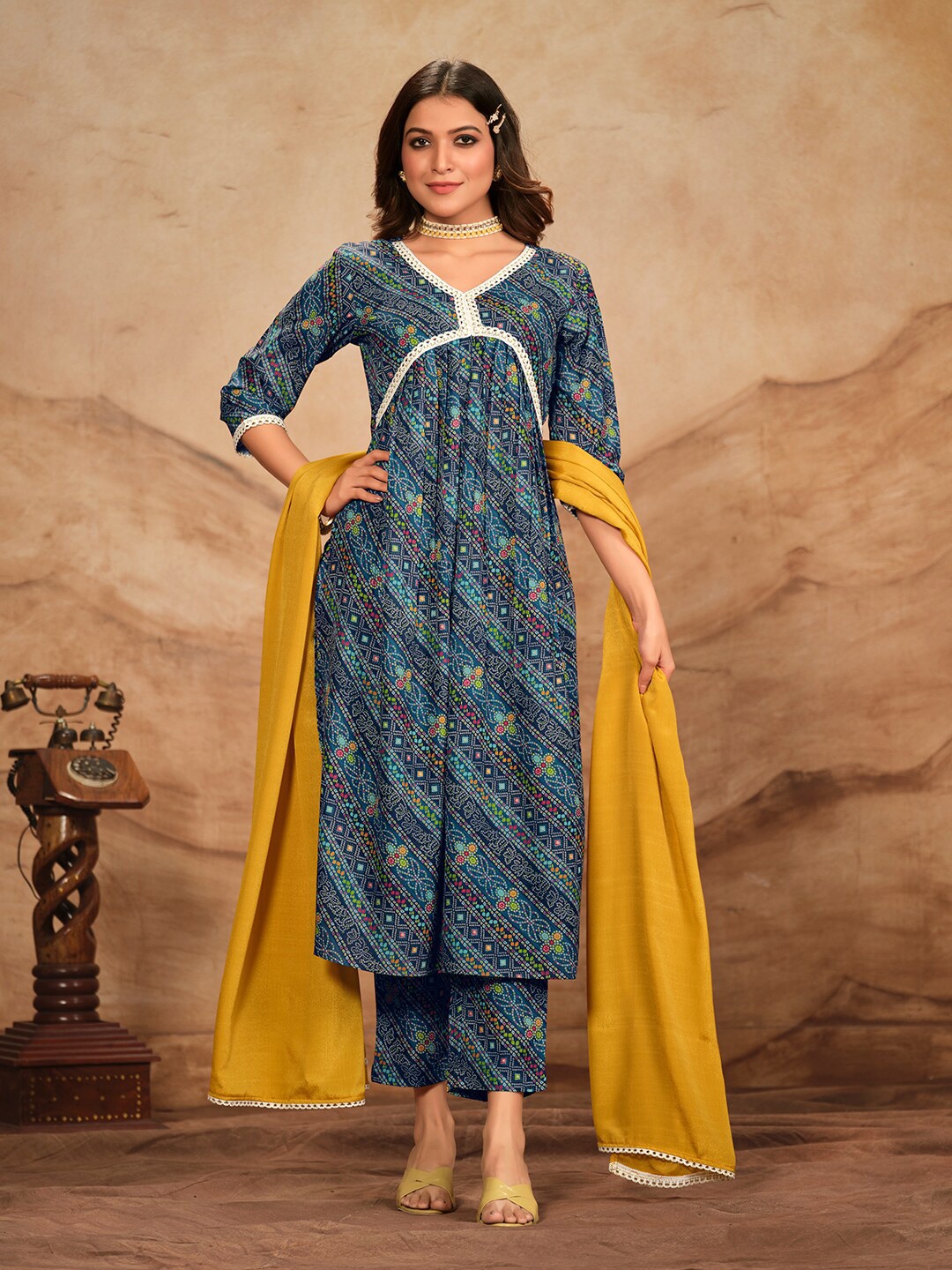 

NAINVISH Geometric Printed Empire Anarkali Kurta with Trouser & Dupatta, Blue