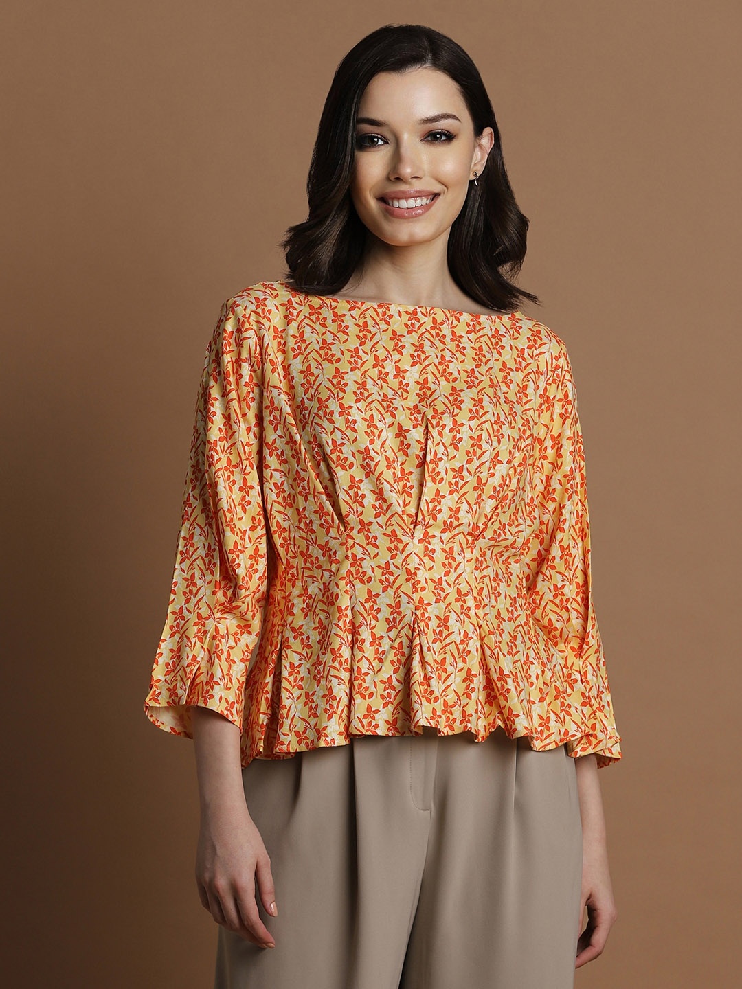 

Allen Solly Woman Orange Print Peplum Top