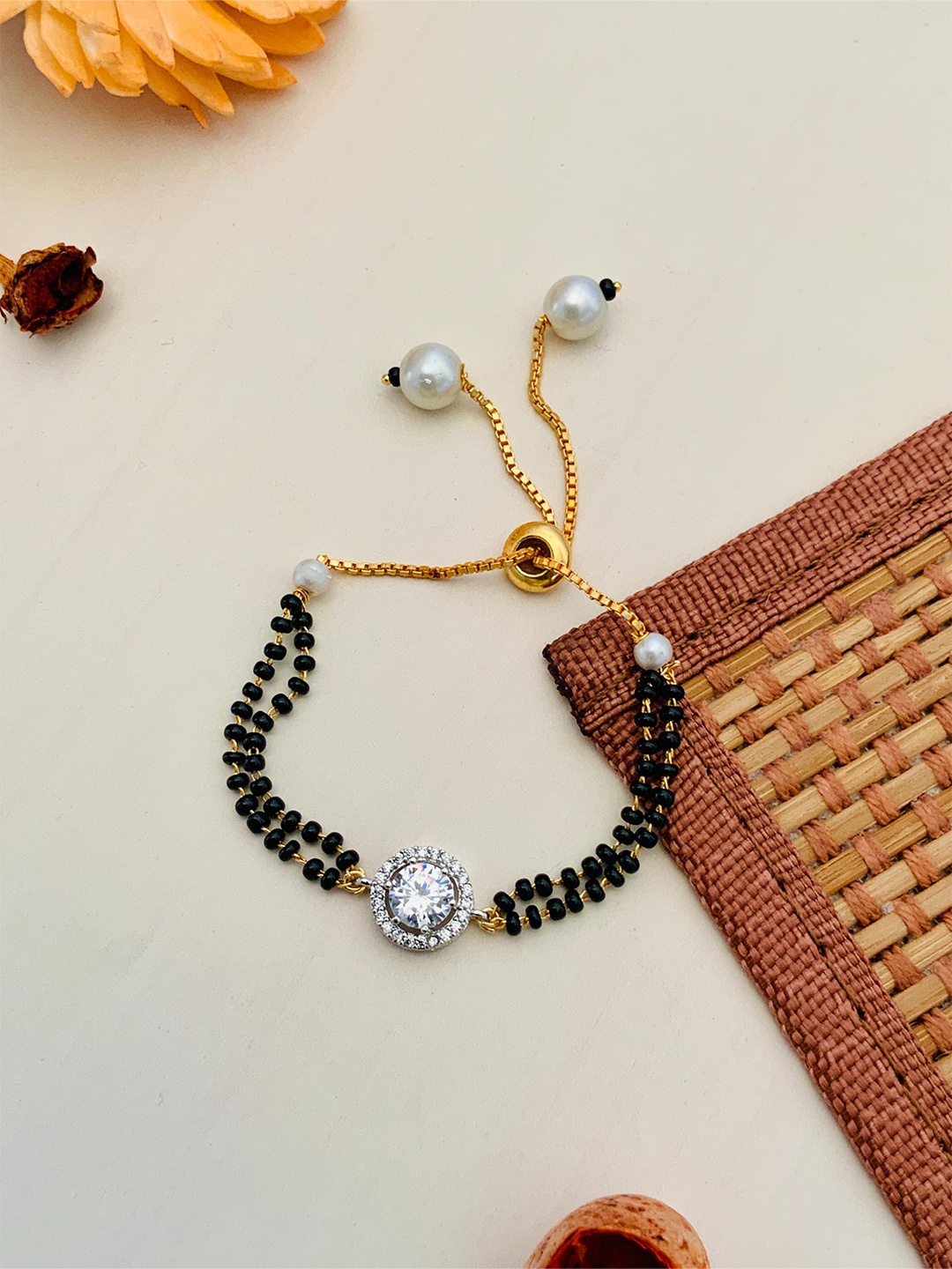 

ABDESIGNS Gold Plated Stone Studded & Pearls Beaded Mangalsutra
