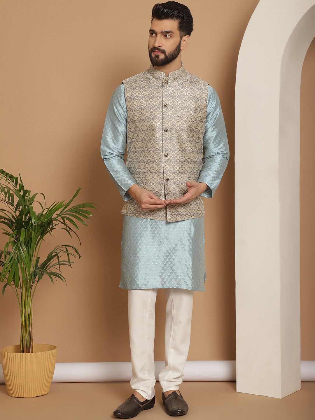 

Anouk Embroidered Regular Thread Work Jacquard Silk Kurta With Churidar & Nehru Jacket, Blue