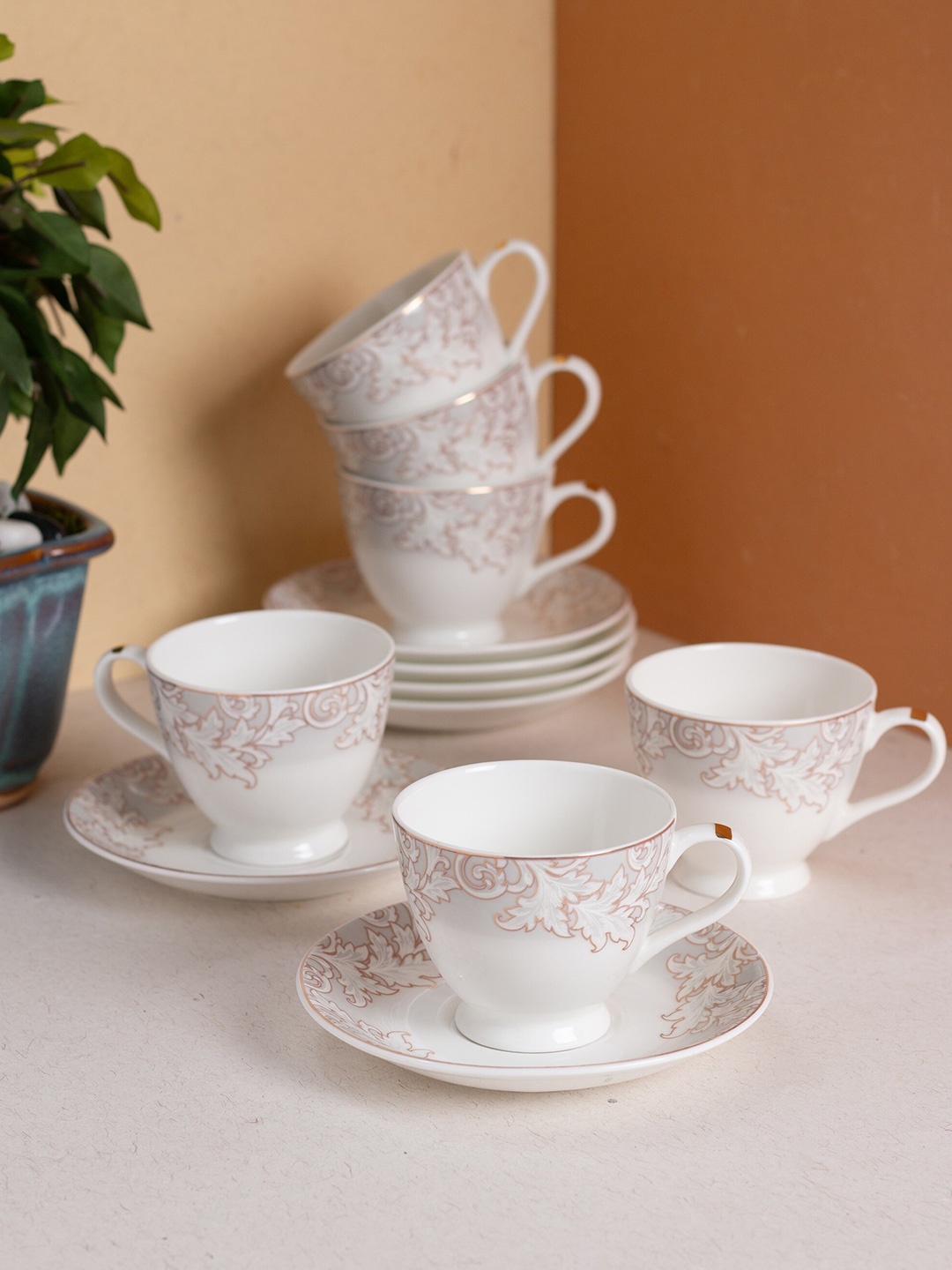 

JCPL White & Brown 12 Pieces Floral Printed Ceramic Glossy Cups and Saucers Set 180 ML