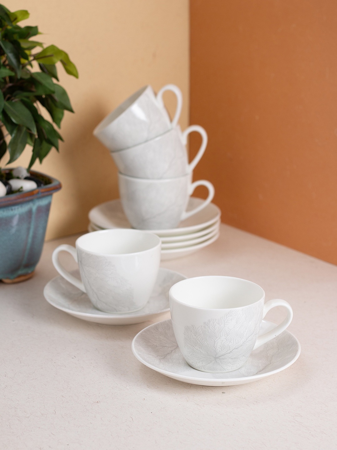 

JCPL Grey Printed 12 Pieces Ceramic Glossy Cups and Saucers 180 ml