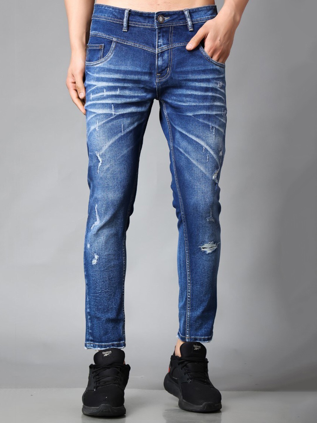 

Stylox Men Slim Fit Mildly Distressed Light Fade Whiskers & Chevrons Stretchable Jeans, Blue