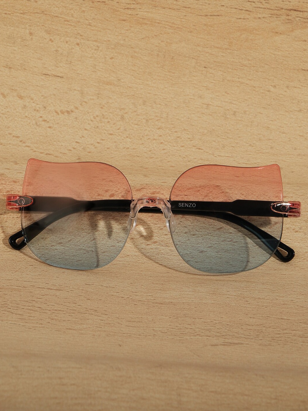 

DukieKooky Kids Rimless Butterfly Sunglasses with UV Protected Lens DKSG435A, Pink