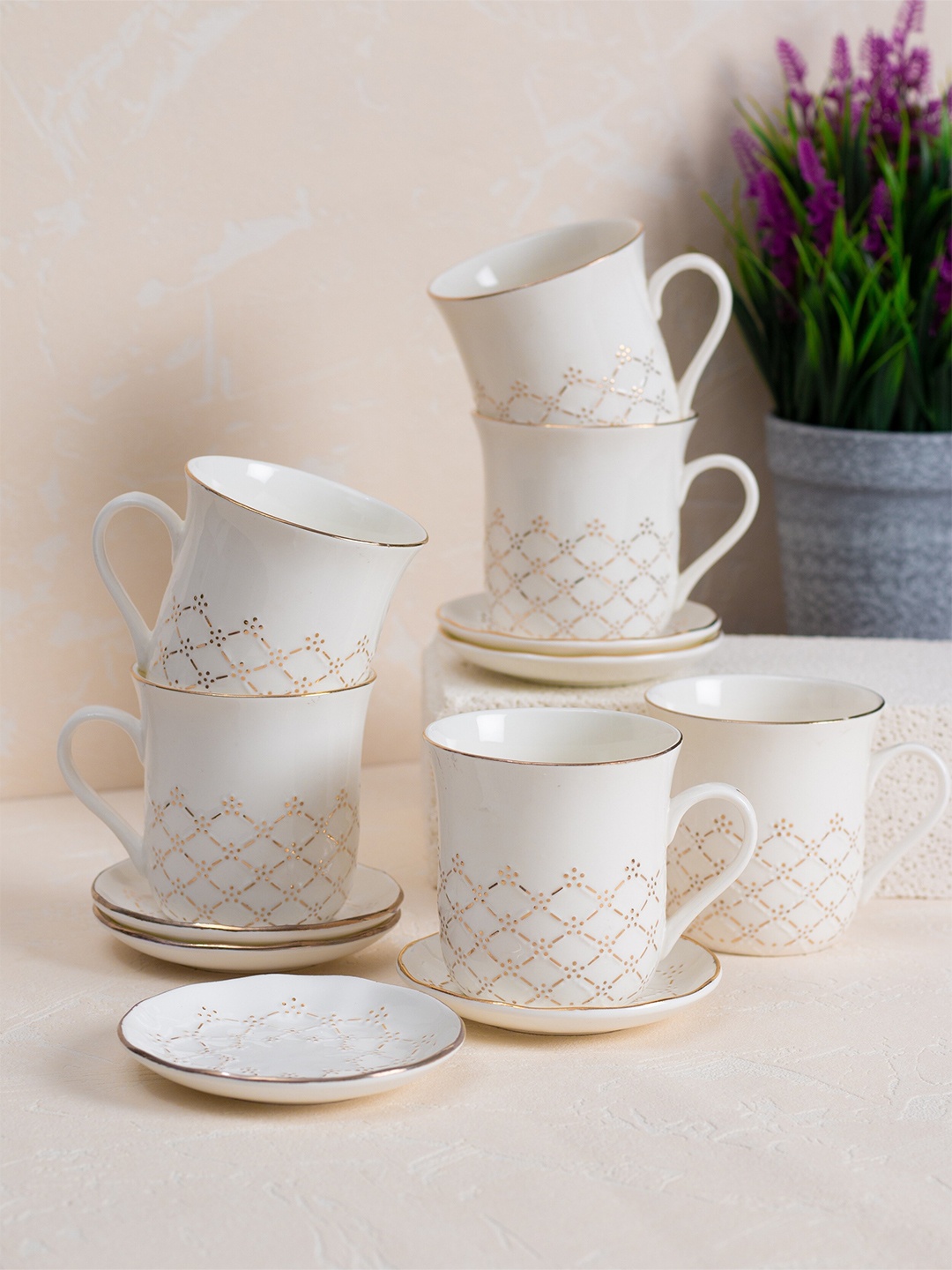

JCPL White & Gold-Toned 12 Pieces Ceramic Printed Glossy Cups and Saucers 180 ml