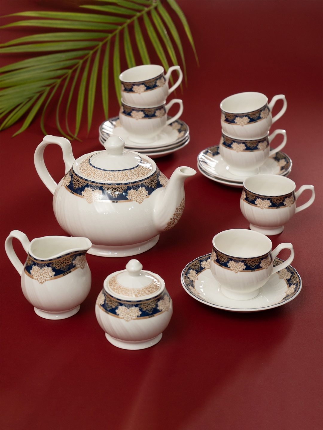 

JCPL White & Blue 15 Pieces Printed Ceramic Glossy Cups & Saucers With Kettle