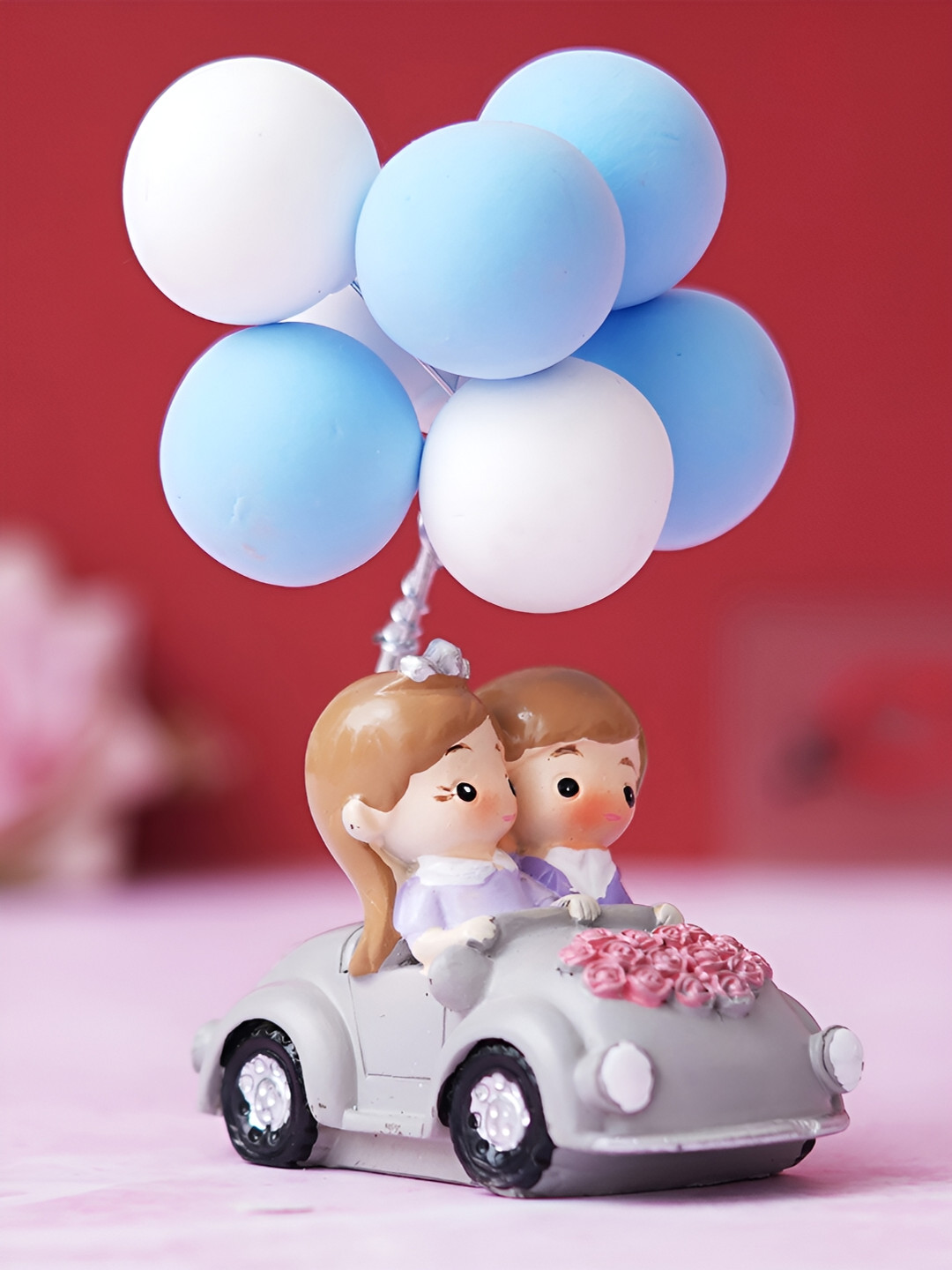 

eCraftIndia White Couple Statue with Balloon On a Car Decorative Showpieces Valentine Gift