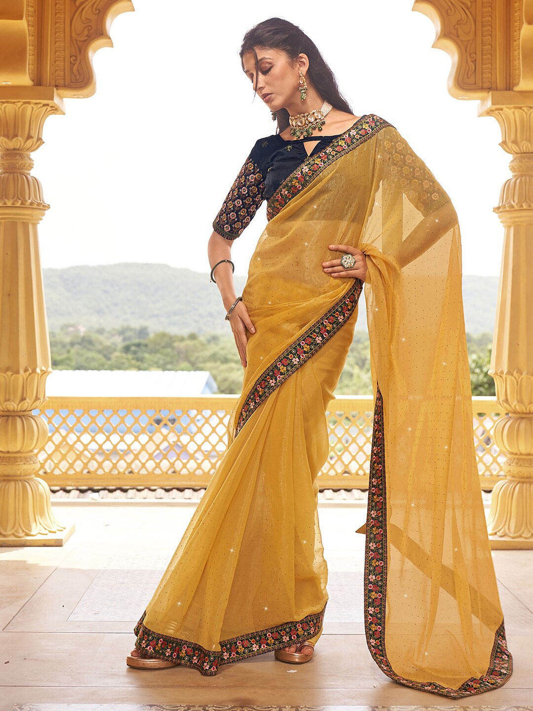 

Satrani Yellow & Green Embellished Embroidered Saree