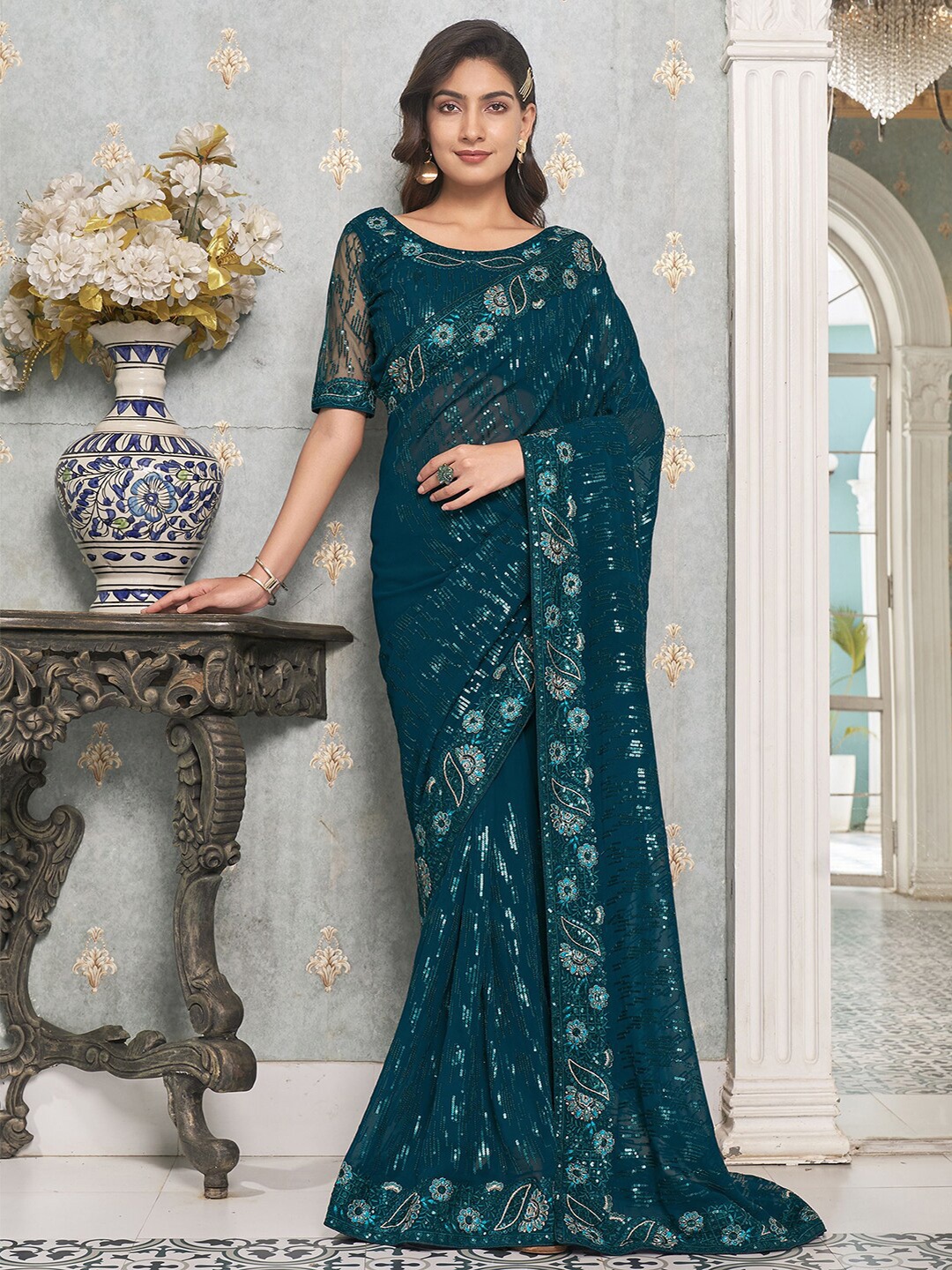

Satrani Teal Green Geometric Sequinned Embroidered Saree
