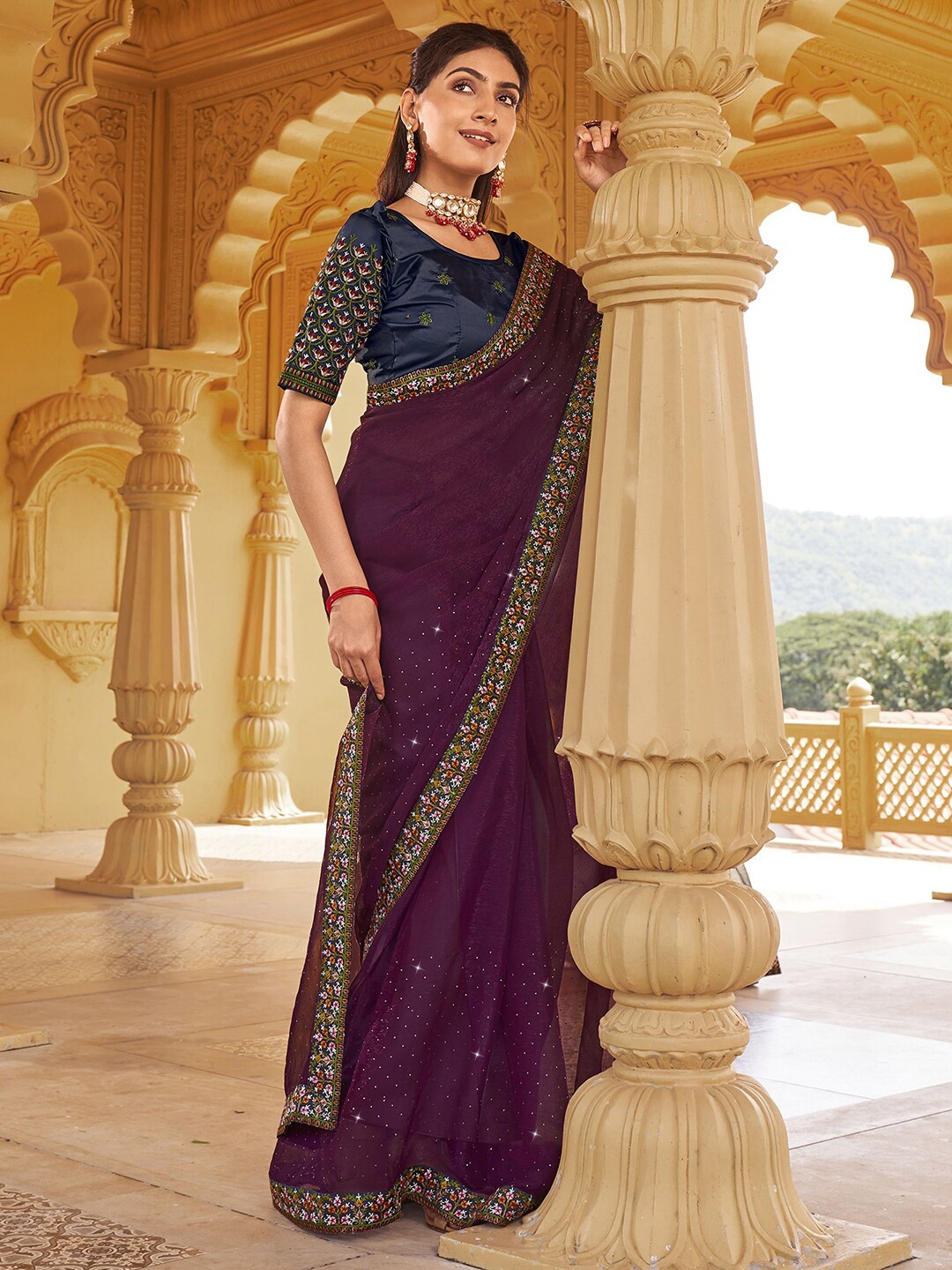 

Satrani Purple & Blue Embellished Embroidered Saree