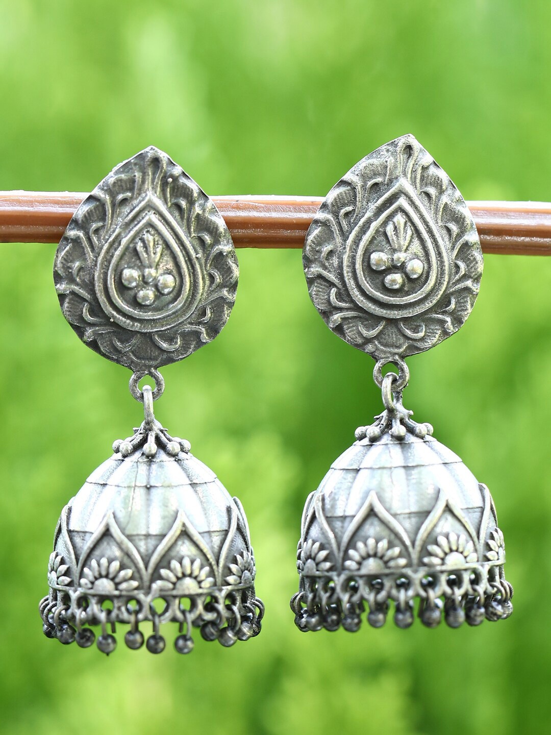 

Anouk Silver-Toned Silver-Plated Oxidised Contemporary Jhumkas