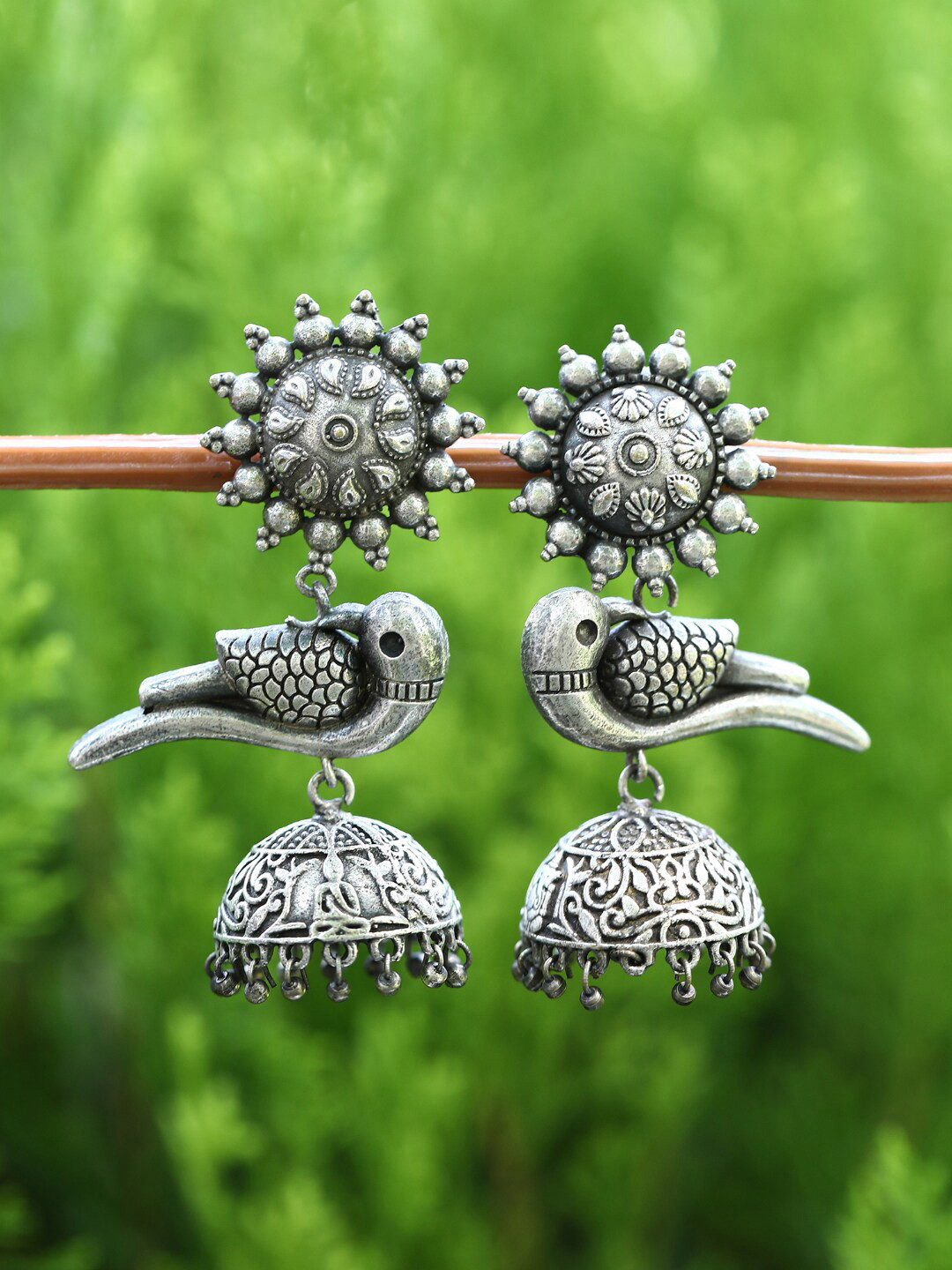 

Sangria Silver-Toned Silver-Plated Bird Shaped Oxidised Jhumkas