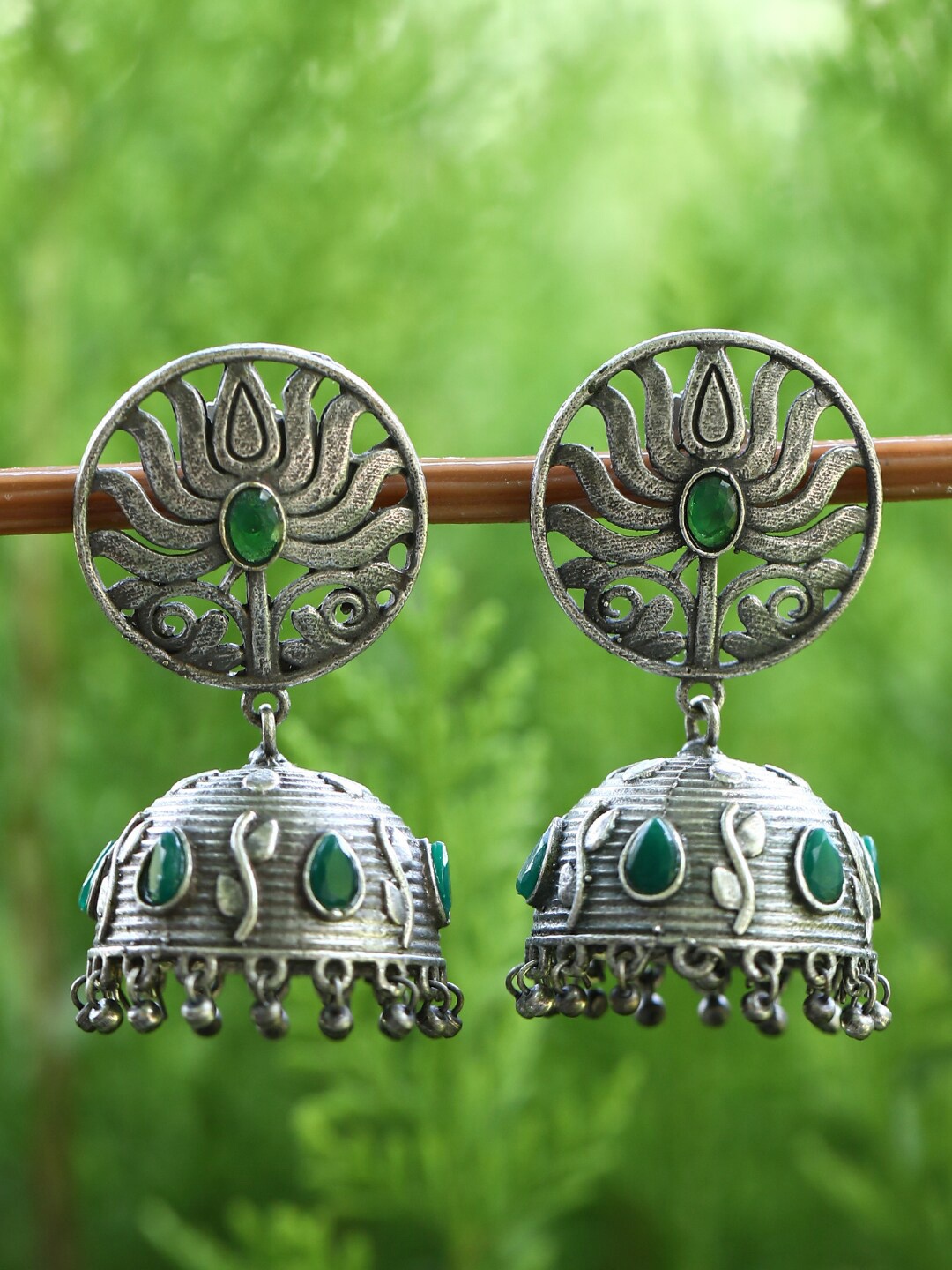 

Sangria Silver-Toned & Green Silver-Plated Stones Studded Dome Shaped Oxidised Jhumkas