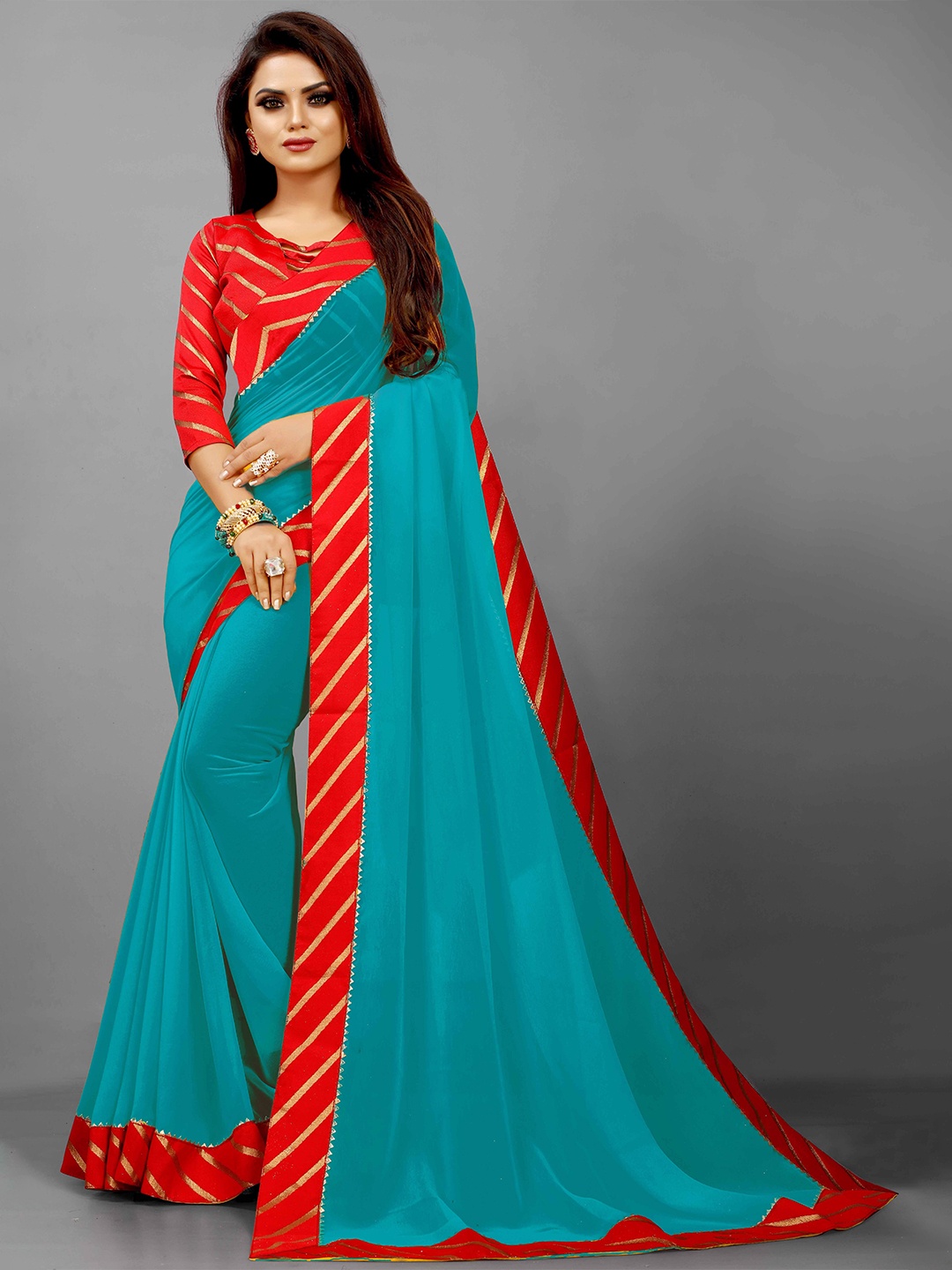 

Flip The Style Turquoise Blue & Red Zari Pure Georgette Saree
