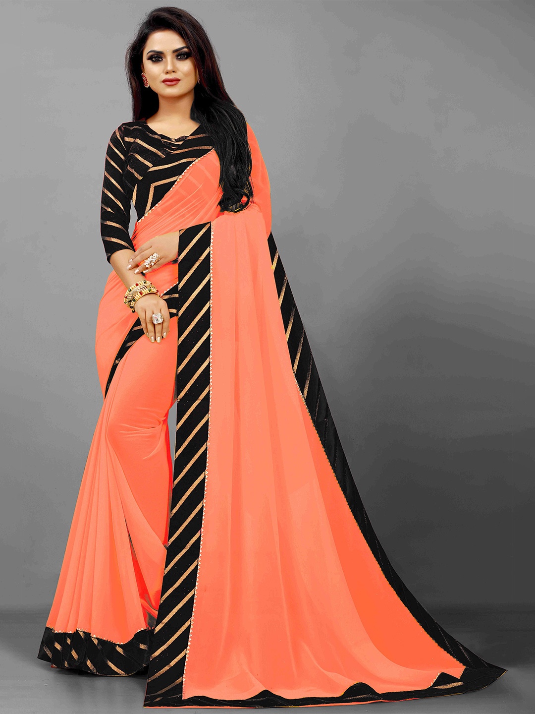 

Flip The Style Striped Embellished Gotta Patti Saree, Orange