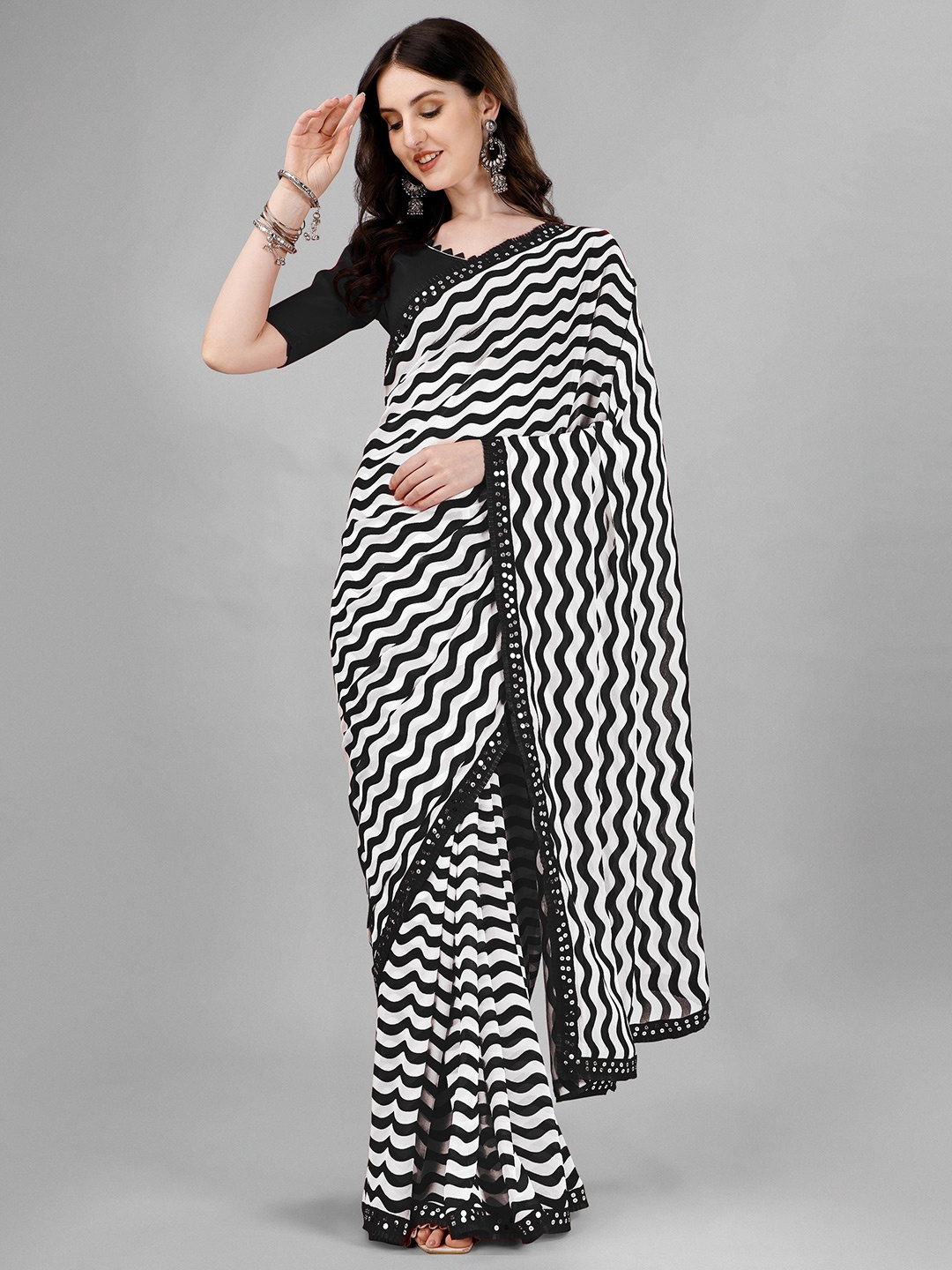 

Flip The Style Striped Embroidered Sequinned Pure Georgette Leheriya Saree, Black