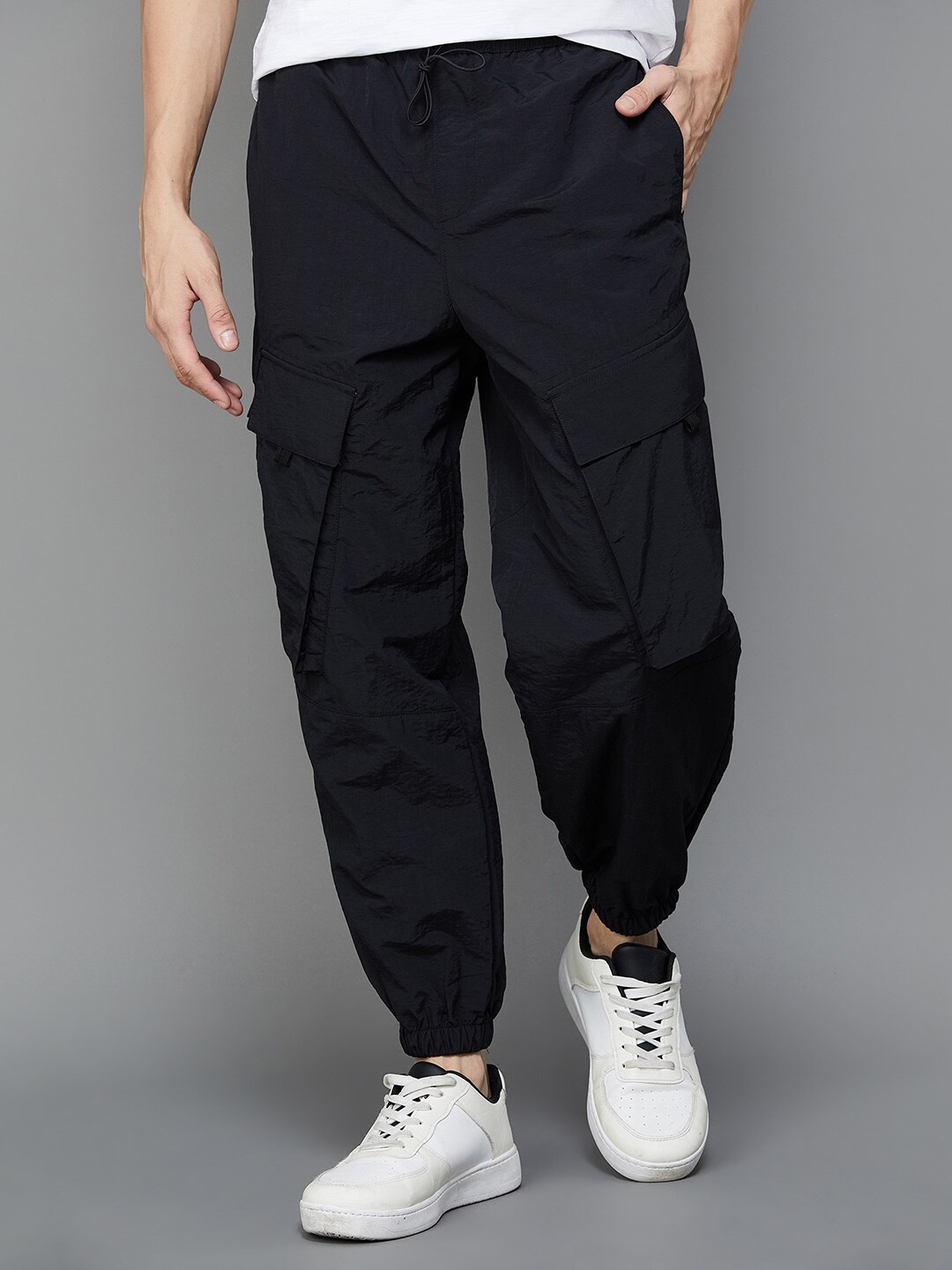 

Bossini Men Solid Cotton Casual Trousers, Black