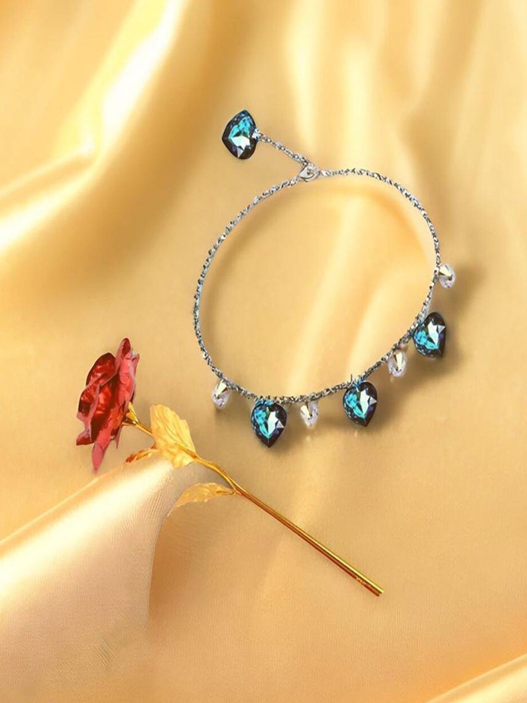 

UNIVERSITY TRENDZ Silver-Plated Stones Studded Charm Bracelet With Artificial Rose