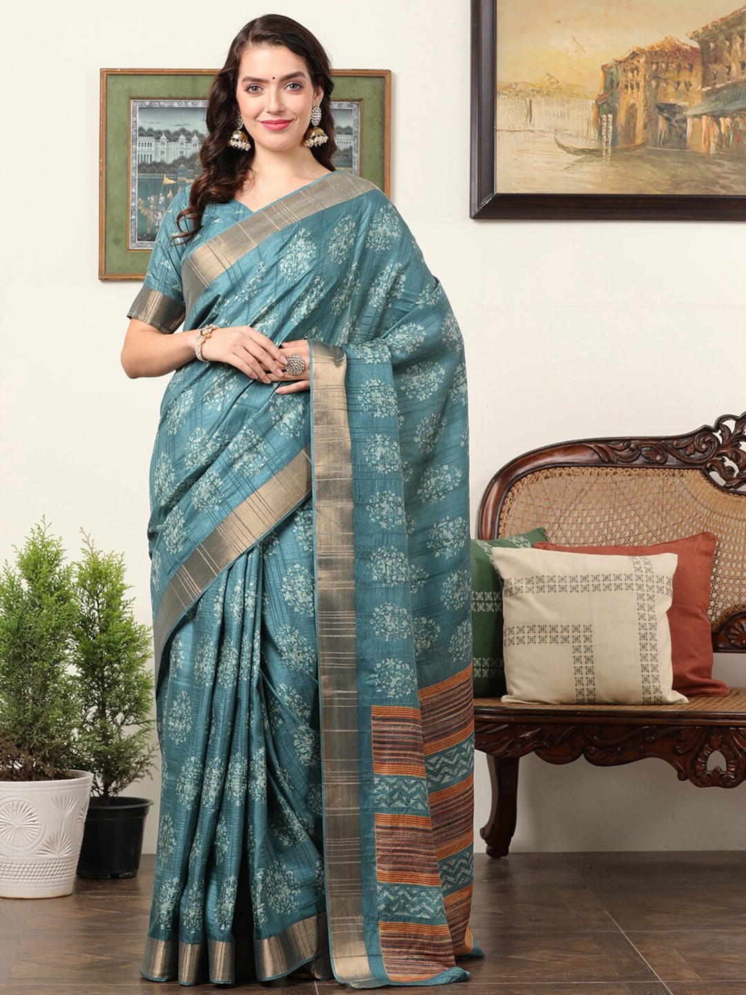 

Mitera Blue & White Floral Zari Sungudi Saree