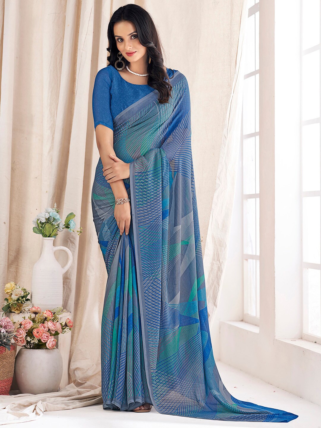 

Mitera Grey & Blue Striped Pure Chiffon Saree